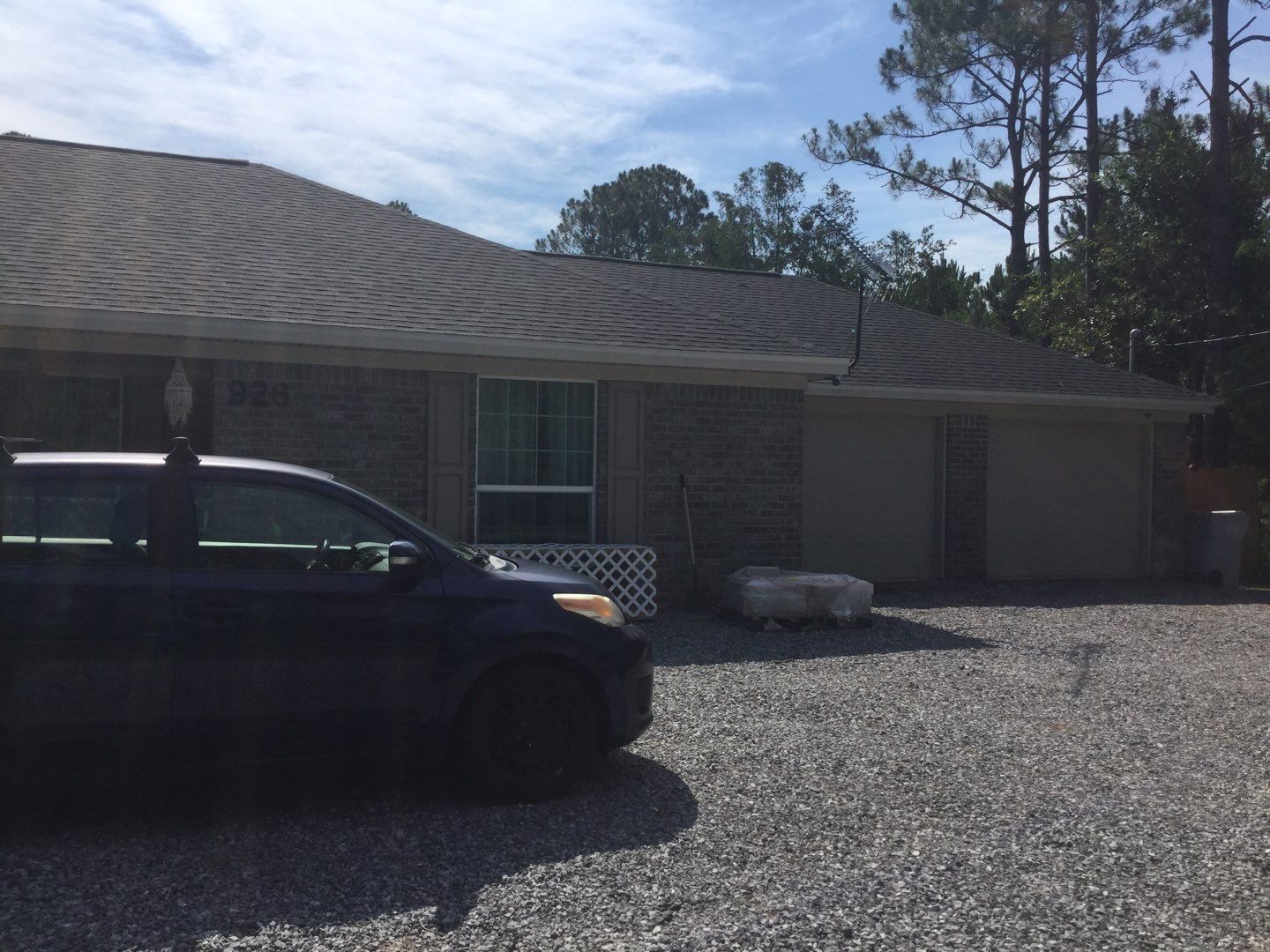 Downspout Installation using White Down Spouts in Milton FL by Gutter Professors