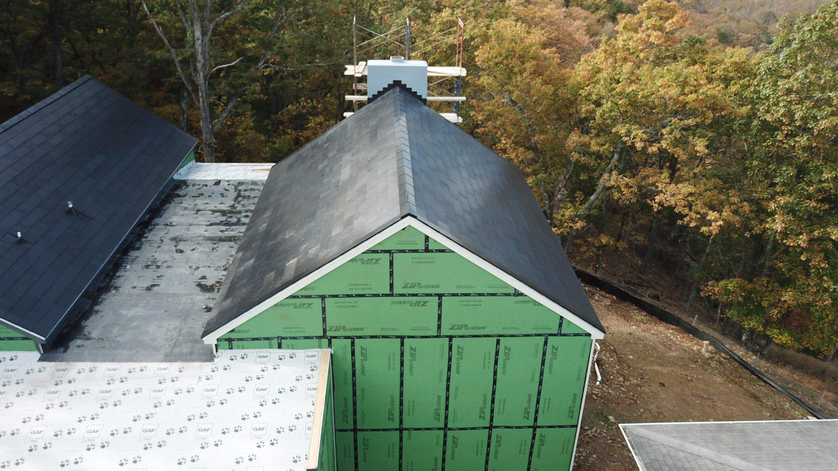 Roof Installation using Tesla Solar Roof V3 by American Home Contractors