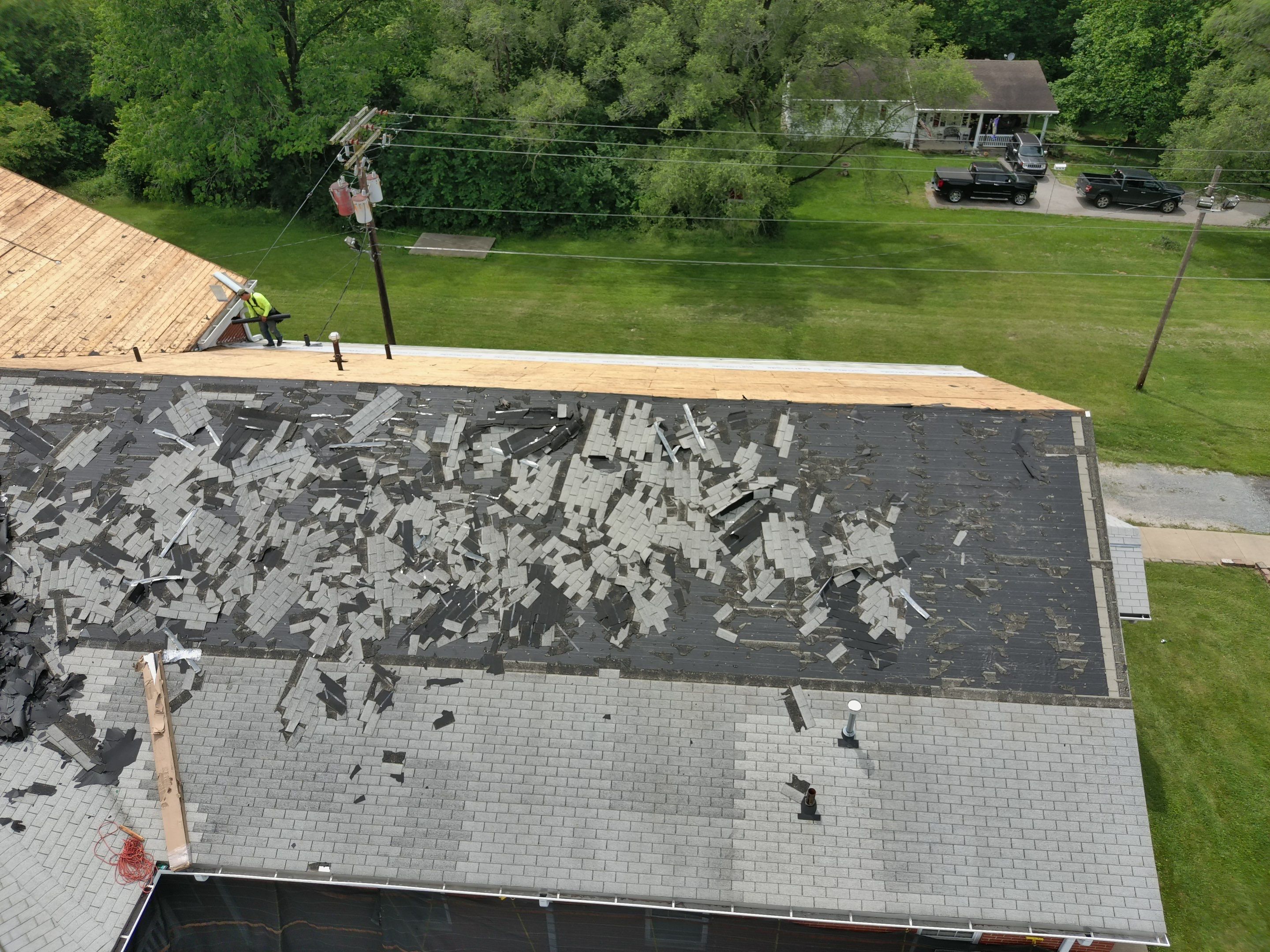 Commercial Roofing Installation using Performance Shingles by Mr. Roofer