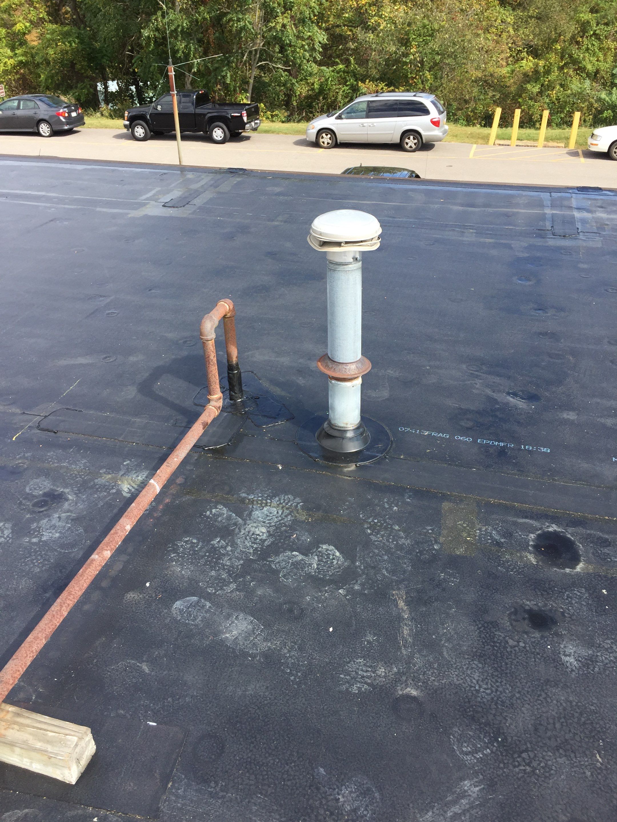 Commercial Rubber Roofing  using Carlisle Rubber Roofing System by Secure Construction Company Inc