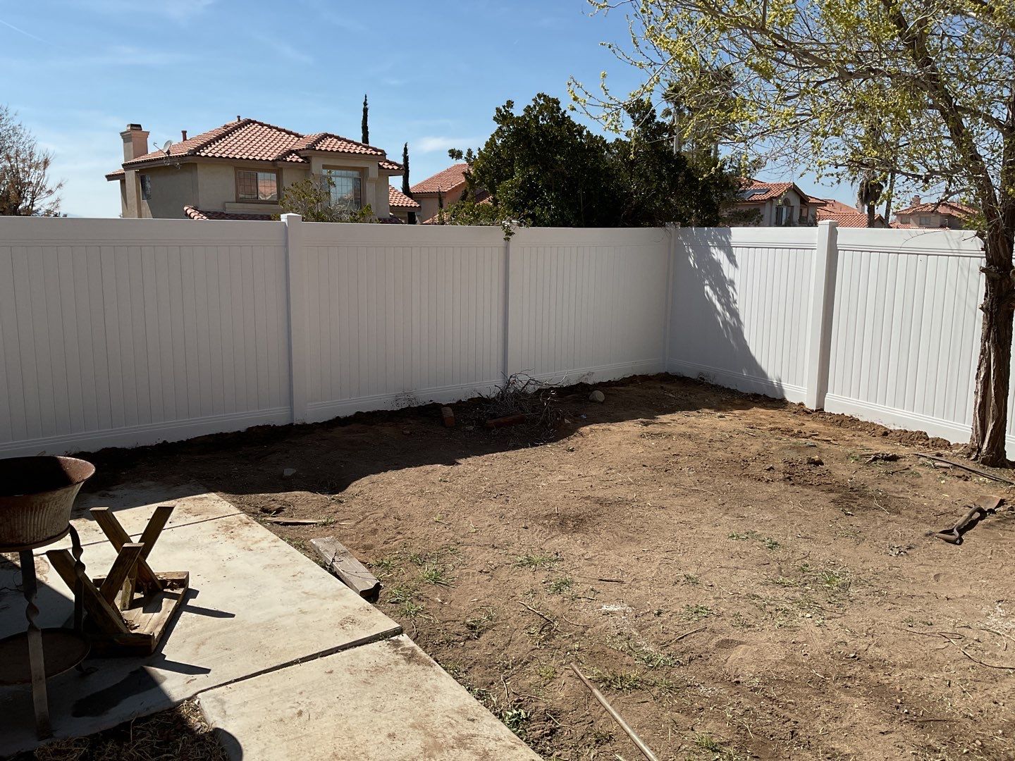 Fence installation using vinyl material by Fence Guys Inc. 