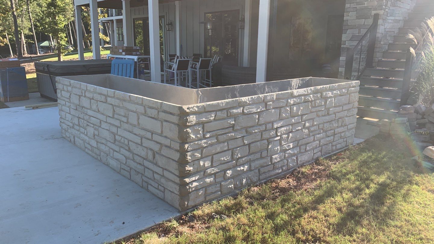 Outdoor Kitchen on Lake Keowee by Xtreme Concrete Services
