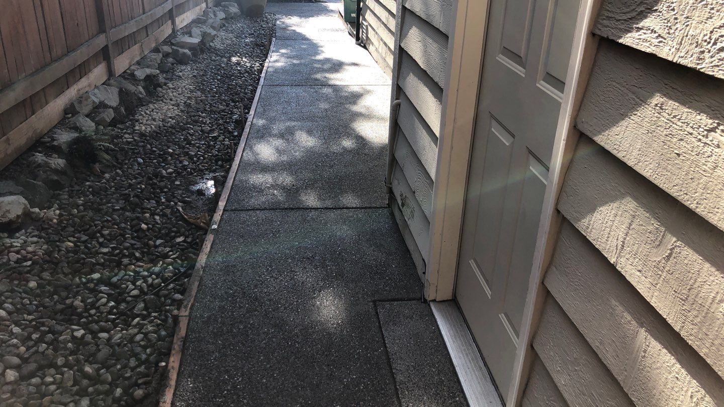Joan | Concrete Driveway & Walkway   by Jireh Asphalt & Concrete Inc 