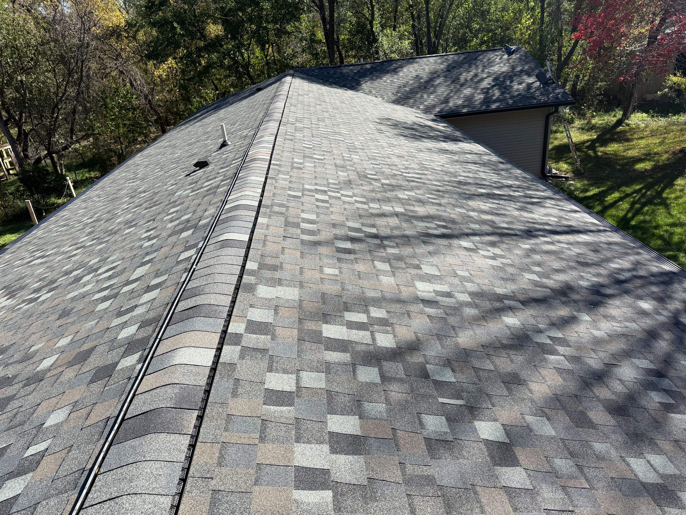 Comprehensive Asphalt Shingle Roof Replacement and Gutter Upgrade in Hastings by Star Home