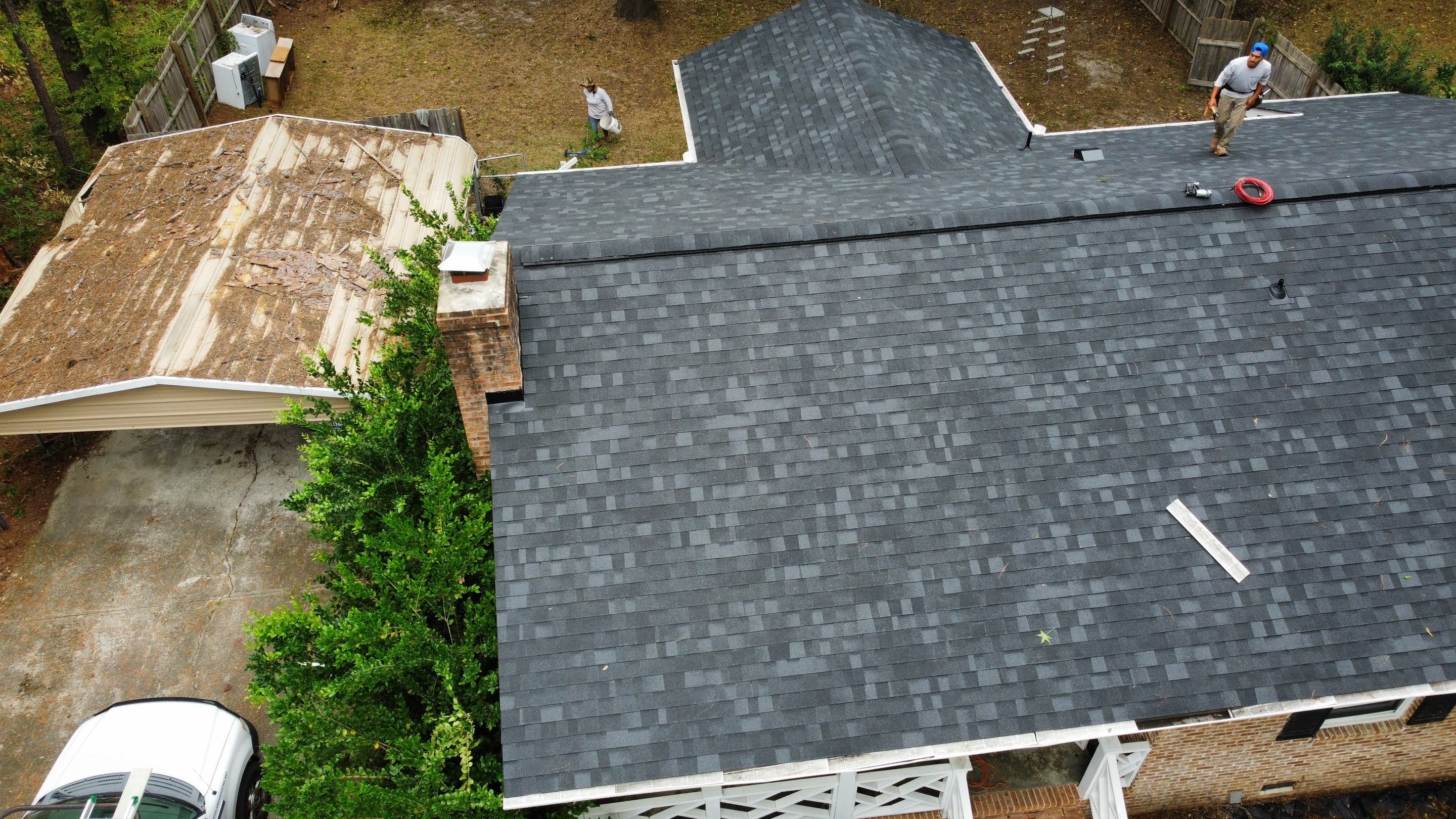 New Onyx Black Shingle Roof Replacement and Tree Damage Repair. by Midlands Roofing & Exteriors