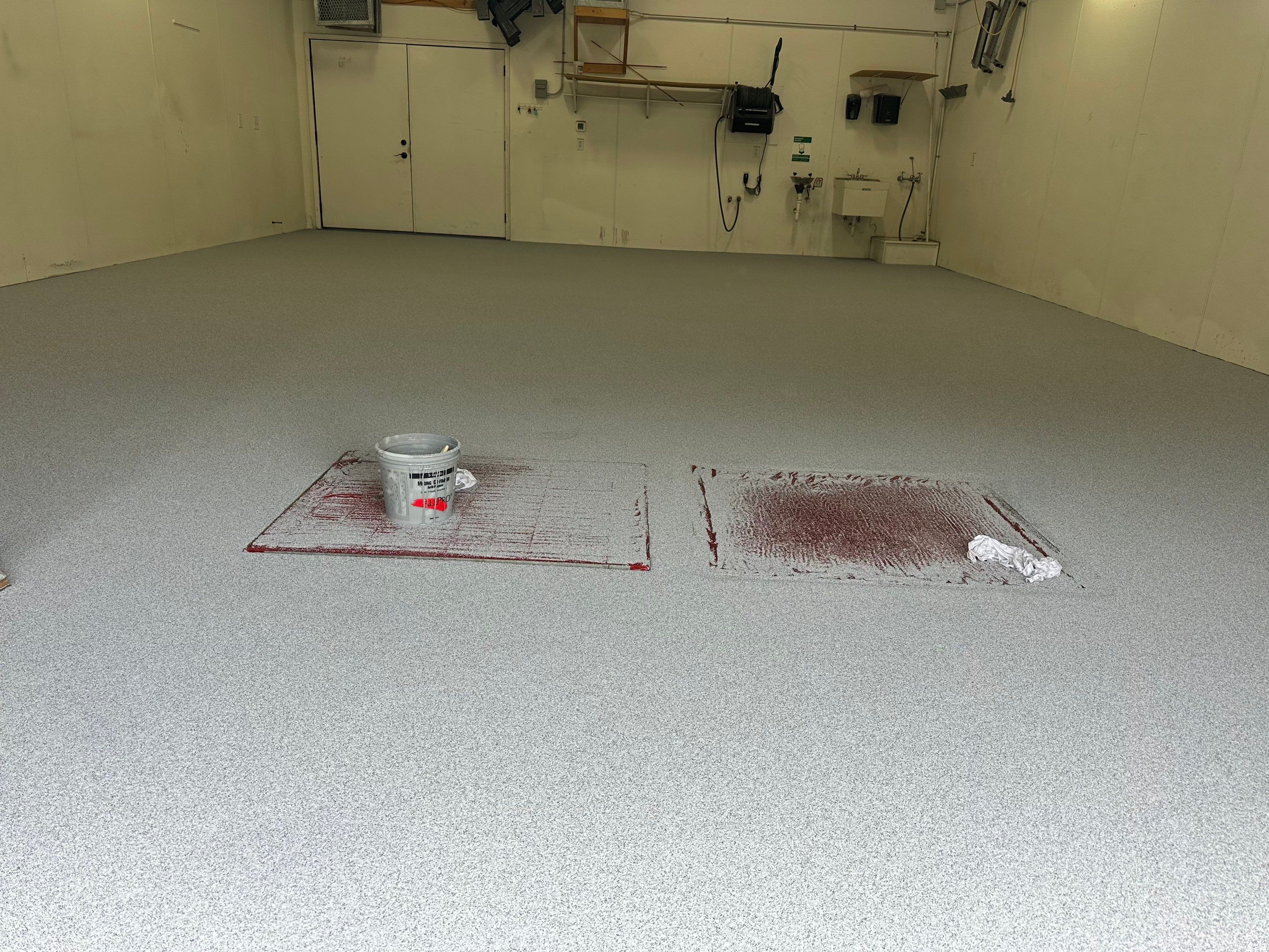 Commercial Grey Speckled Epoxy Floor Coating for Industrial Workshop by Select Painting, Coatings & Garage Cabinets