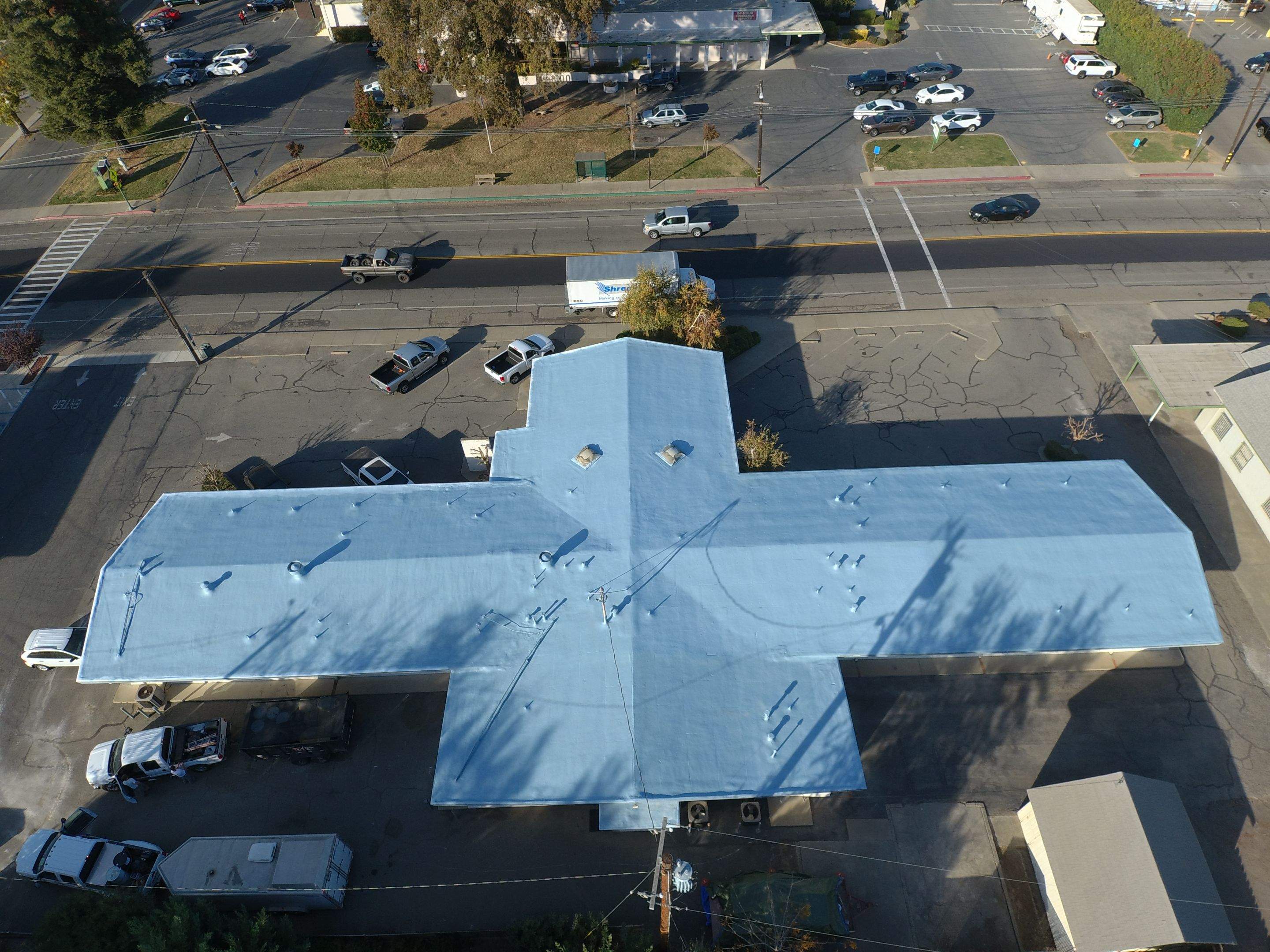 Spray foam and coatings using Conklin Benchmark/PUMA XL coatings and spray foam by Straight Edge Roofing Inc