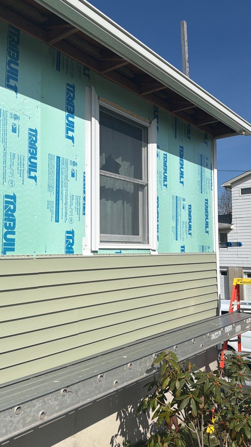 Siding refresh with Cert Monogram D/4 x 12'6" clapboard, Cypress by DiGiorgi Roofing and Siding Inc