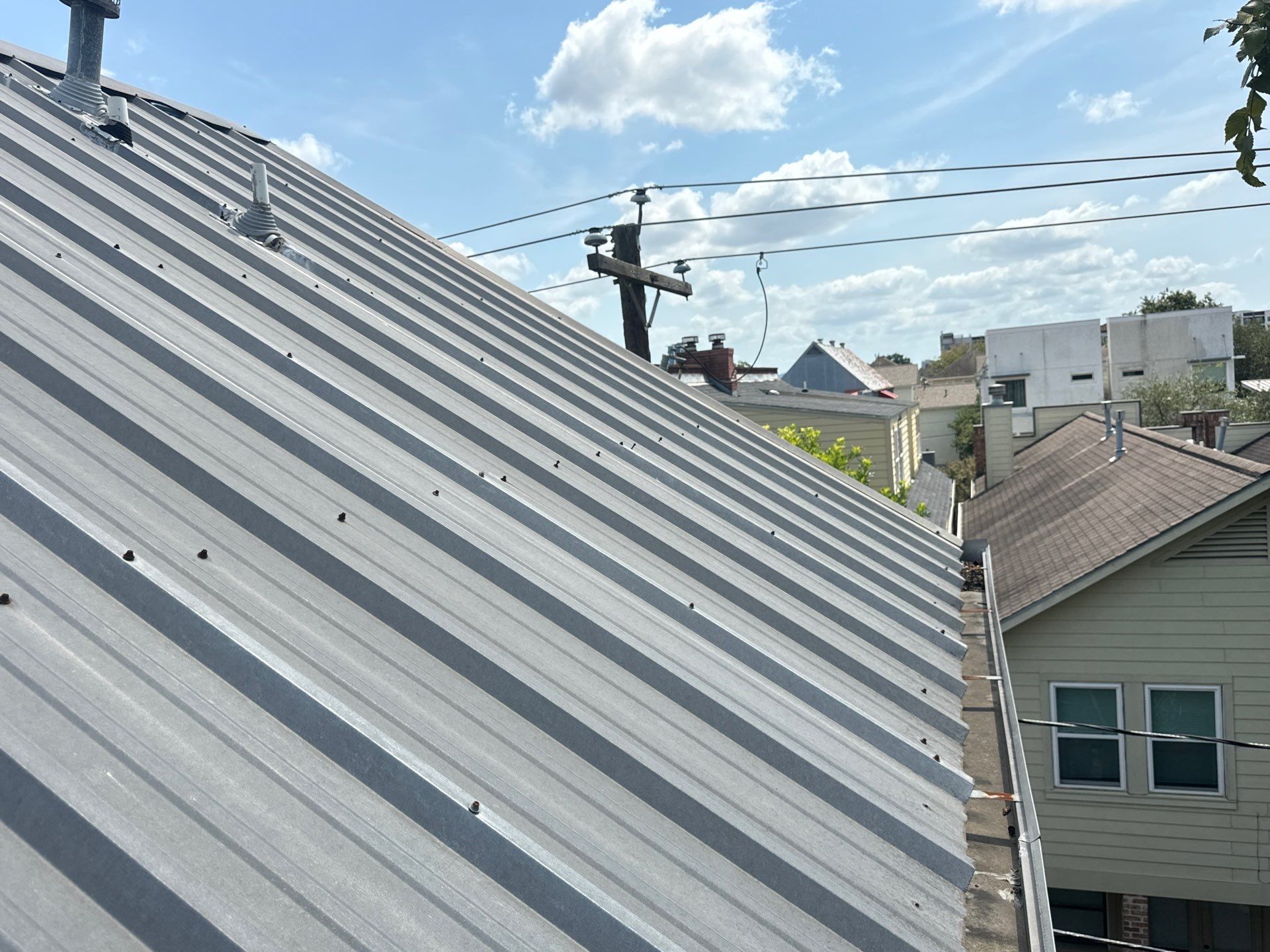 Metal Roof Leak Repair by Associates Roofing Unlimited