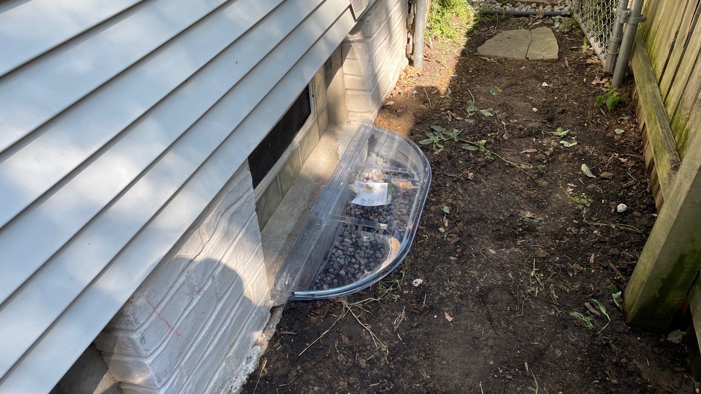 Drain Tile, Window Wells & Buried Discharge in Minneapolis by Waterproofing Northeast