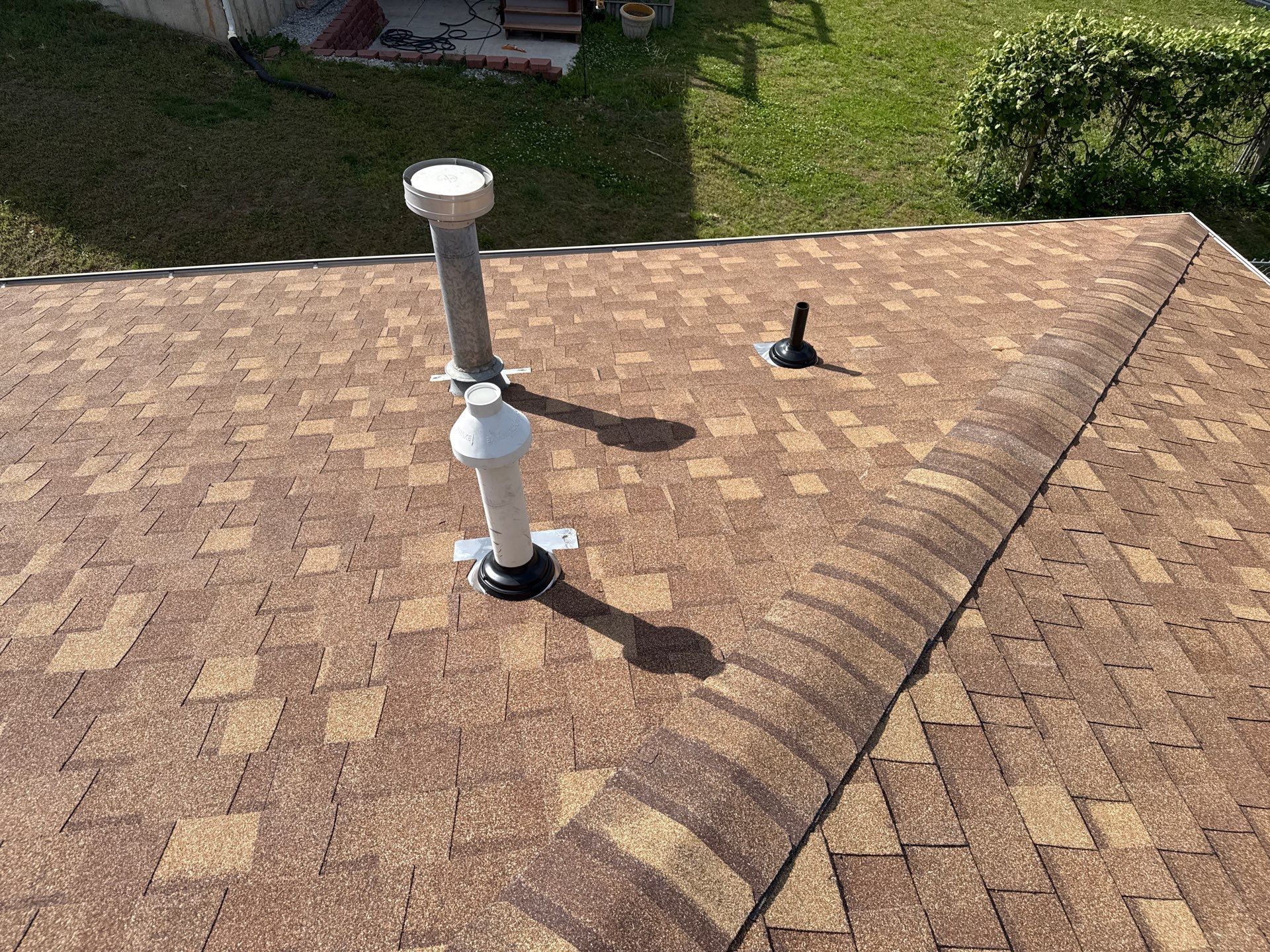 Storm-Damaged Roof & Gutter Replacement by Eaton Roofing 