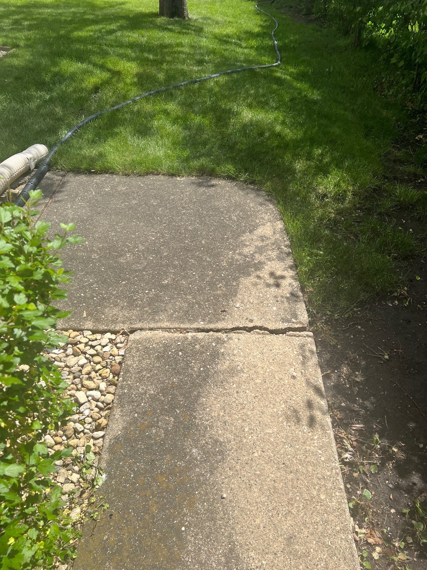 concrete patio power washing  by Northern Power Washing LLC.
