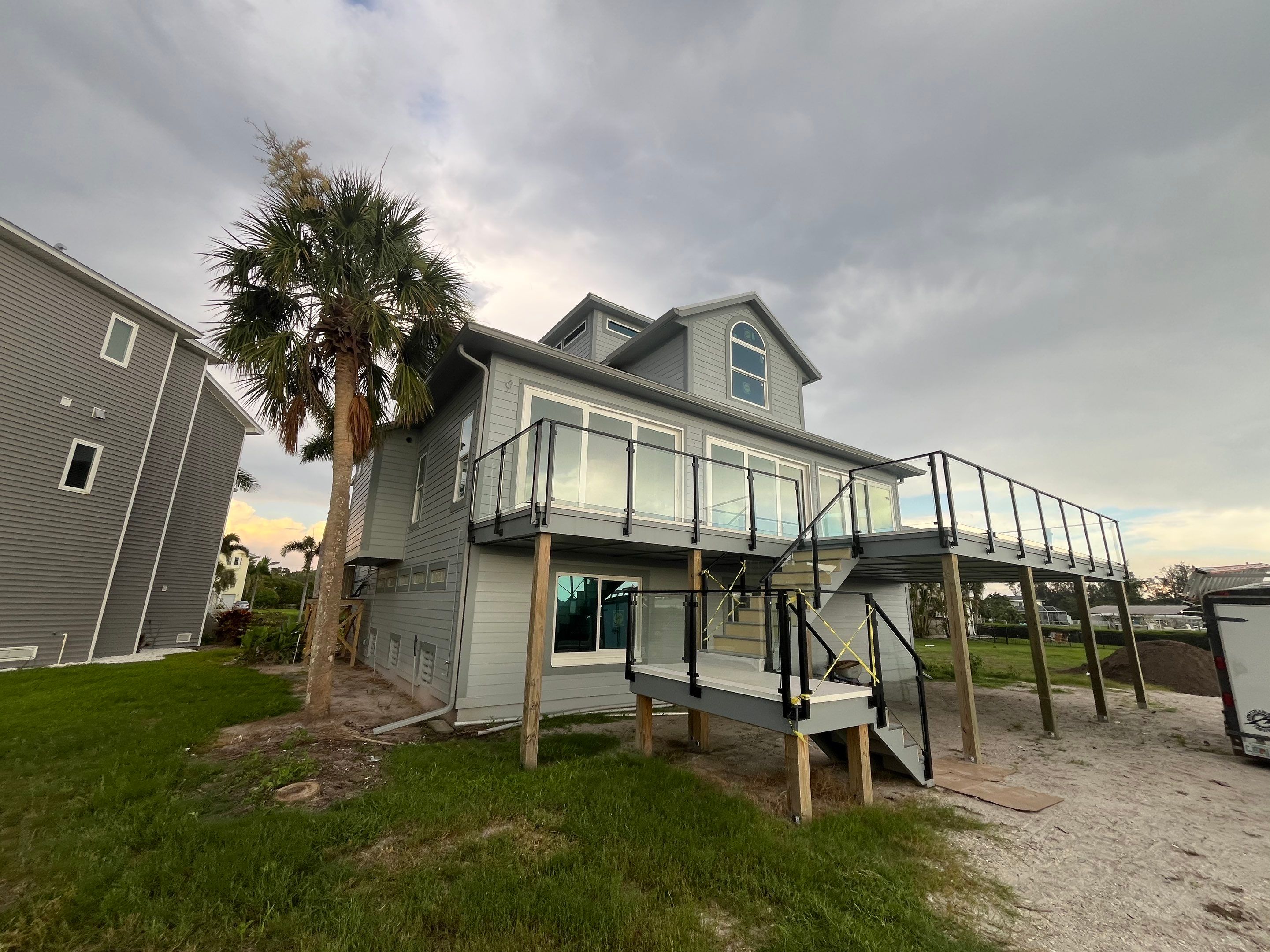 Downspout Installation Dove Grey Palmetto FL by Gutter Professors