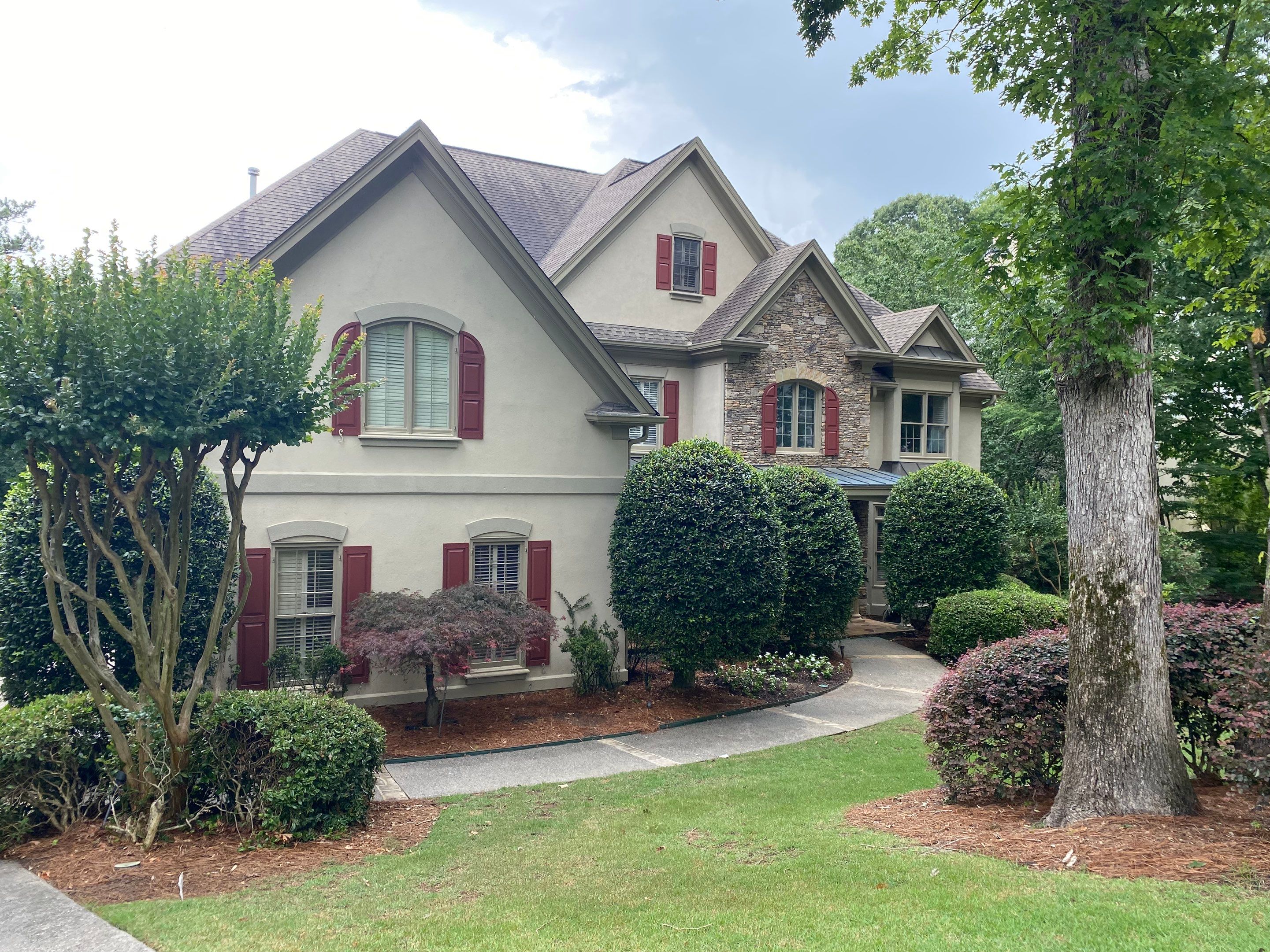 Exterior Painting and Shutter Refresh for a Roswell Stucco Home by Swift Home Renovations