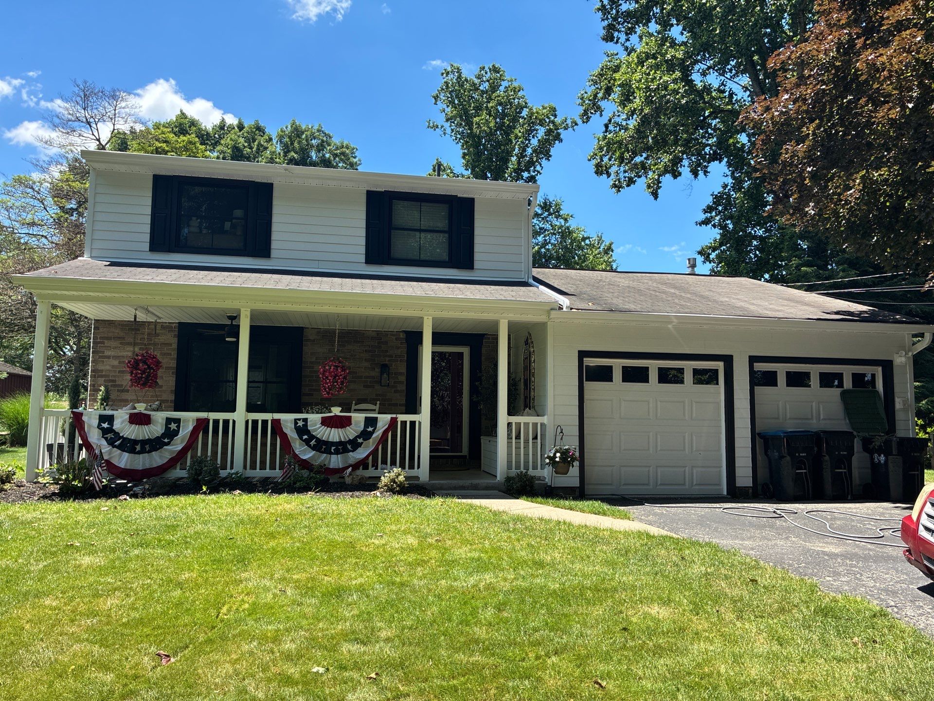Vinyl Siding to James Hardie Arctic White with Midnight Black Trim by Ideal Siding Pittsburgh