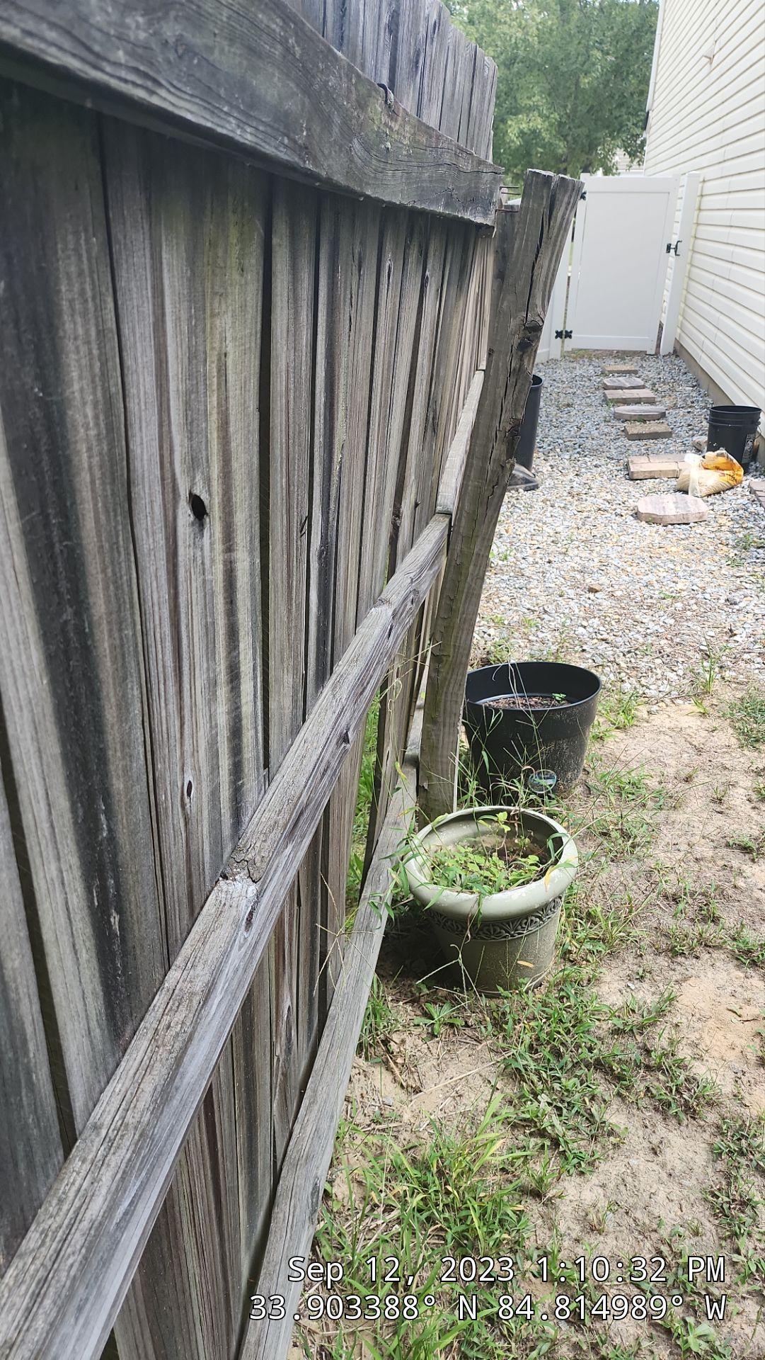 Dogear Wood Privacy Fence by Titans of Timber Fence & Stain