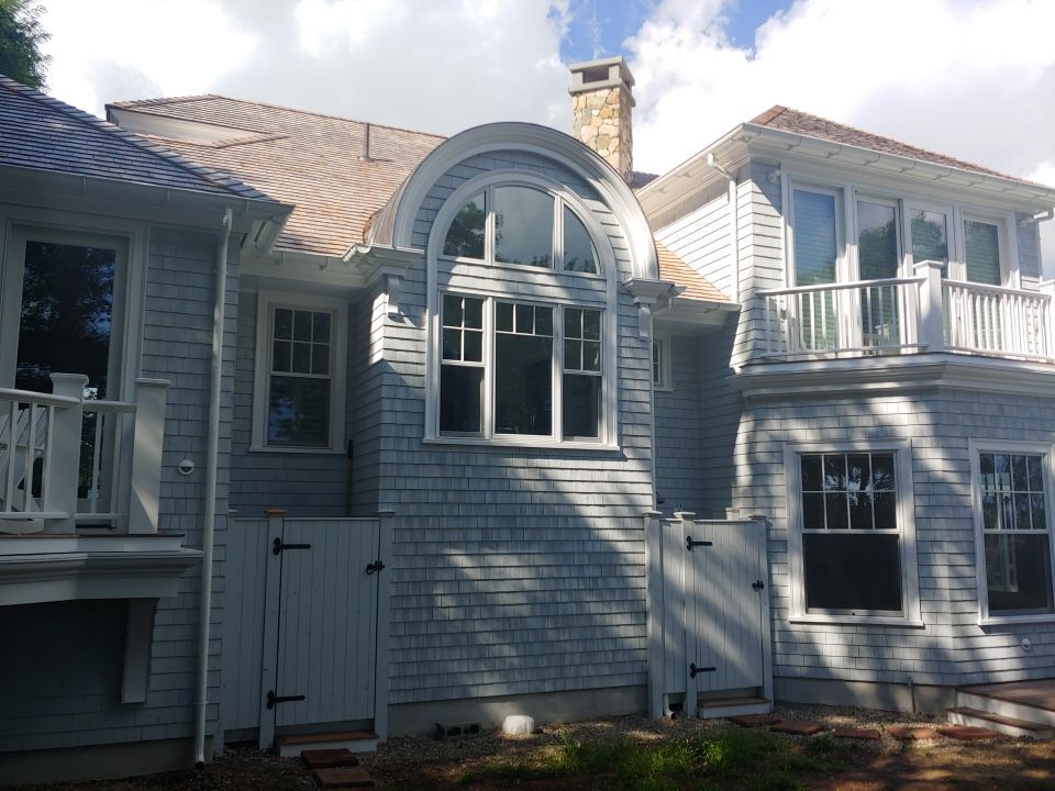 Gutter Installation using 6" Half Round Aluminum Gutter over Crown Moulding by Gutter Pro Enterprises