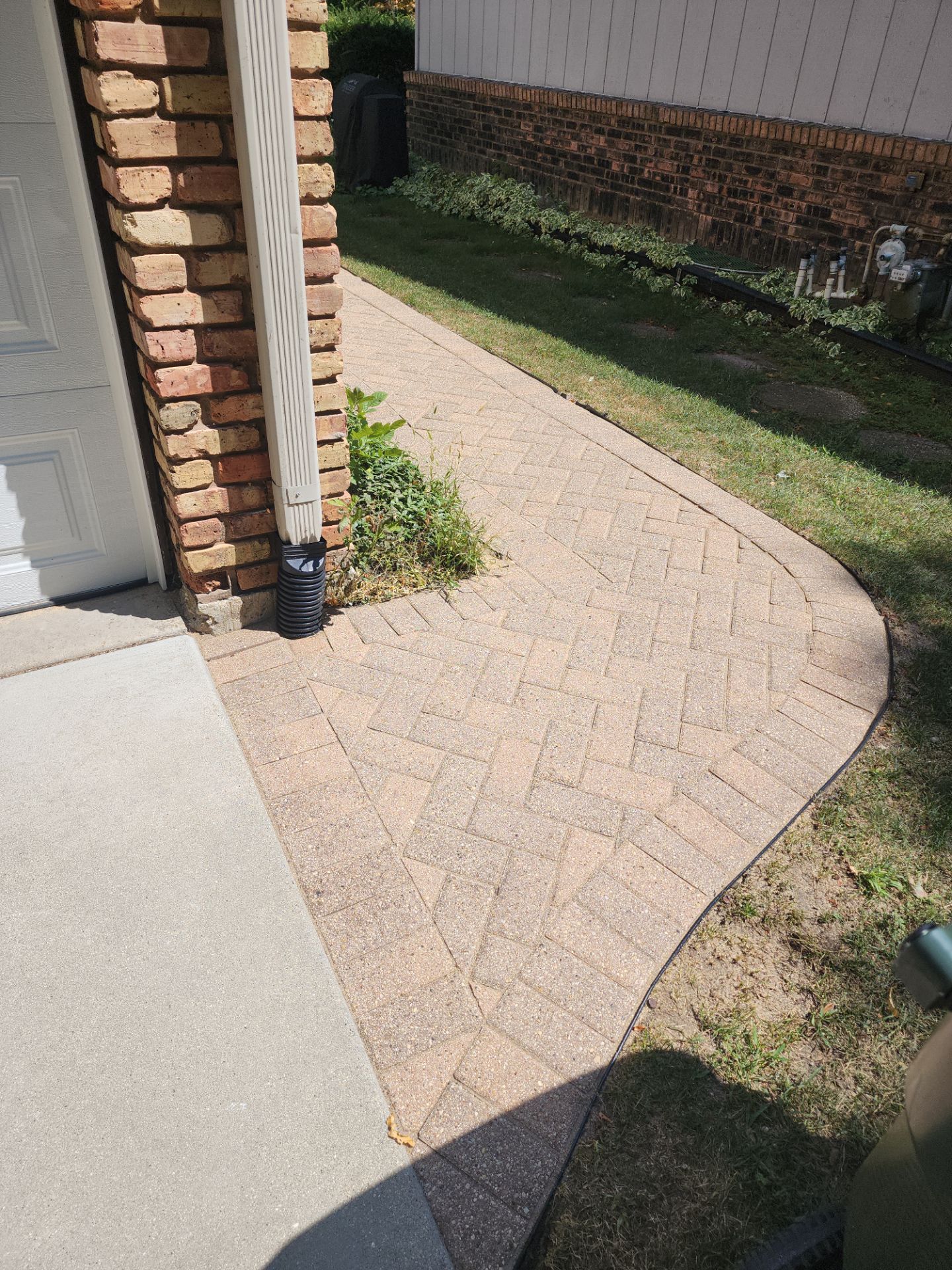 Arlington Heights Brick paver repair, cleaning and sealing by Northern Power Washing LLC.