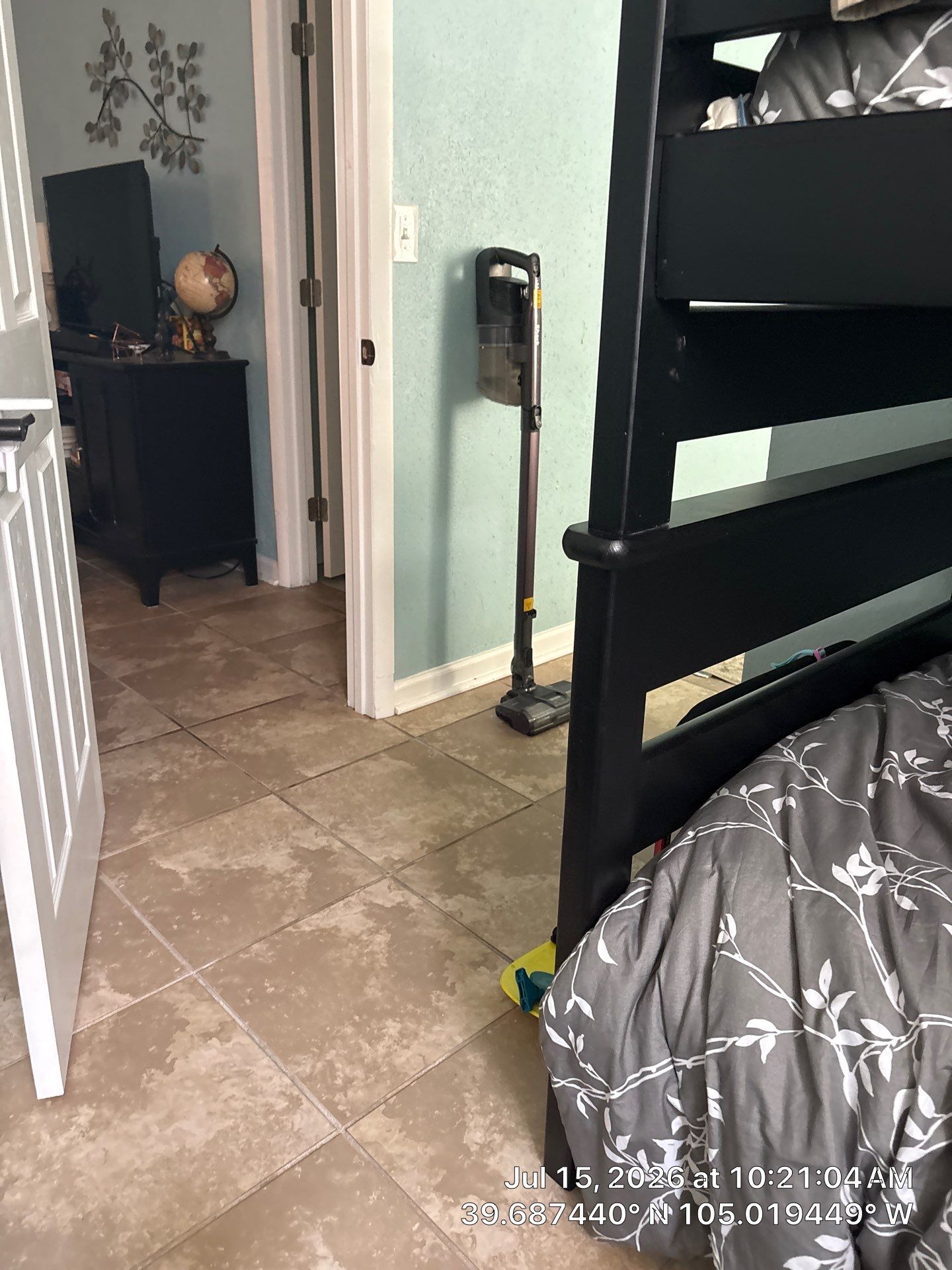 Denver Interior Bedroom Remodel Featuring New Paint and Tile Flooring by CompanyCam Sales Demo