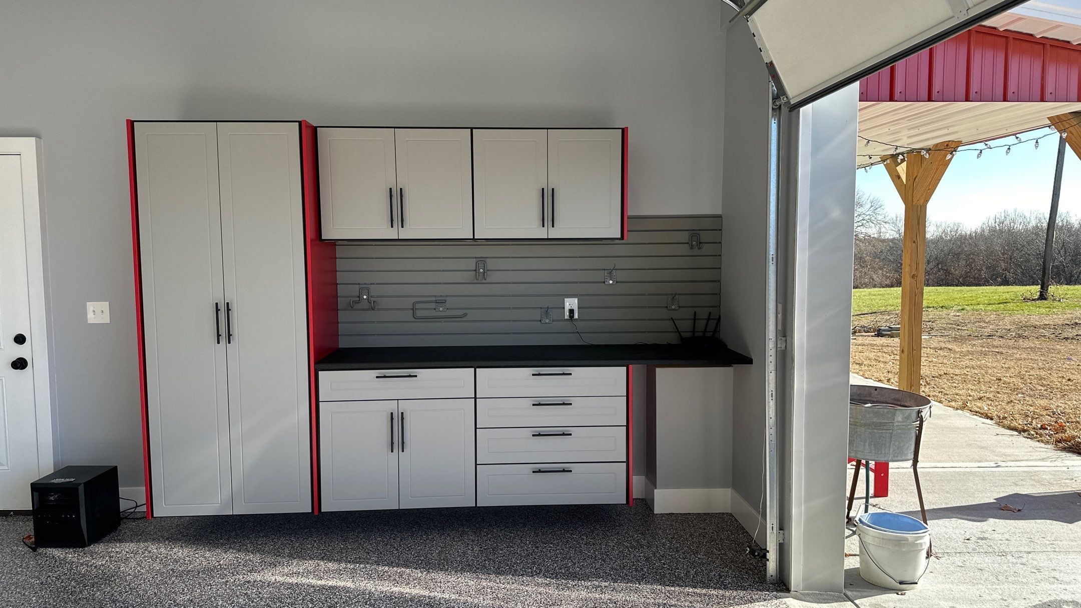 Becky & Brit Upgraded their garage with an amazing cabinet design by Banner Garage