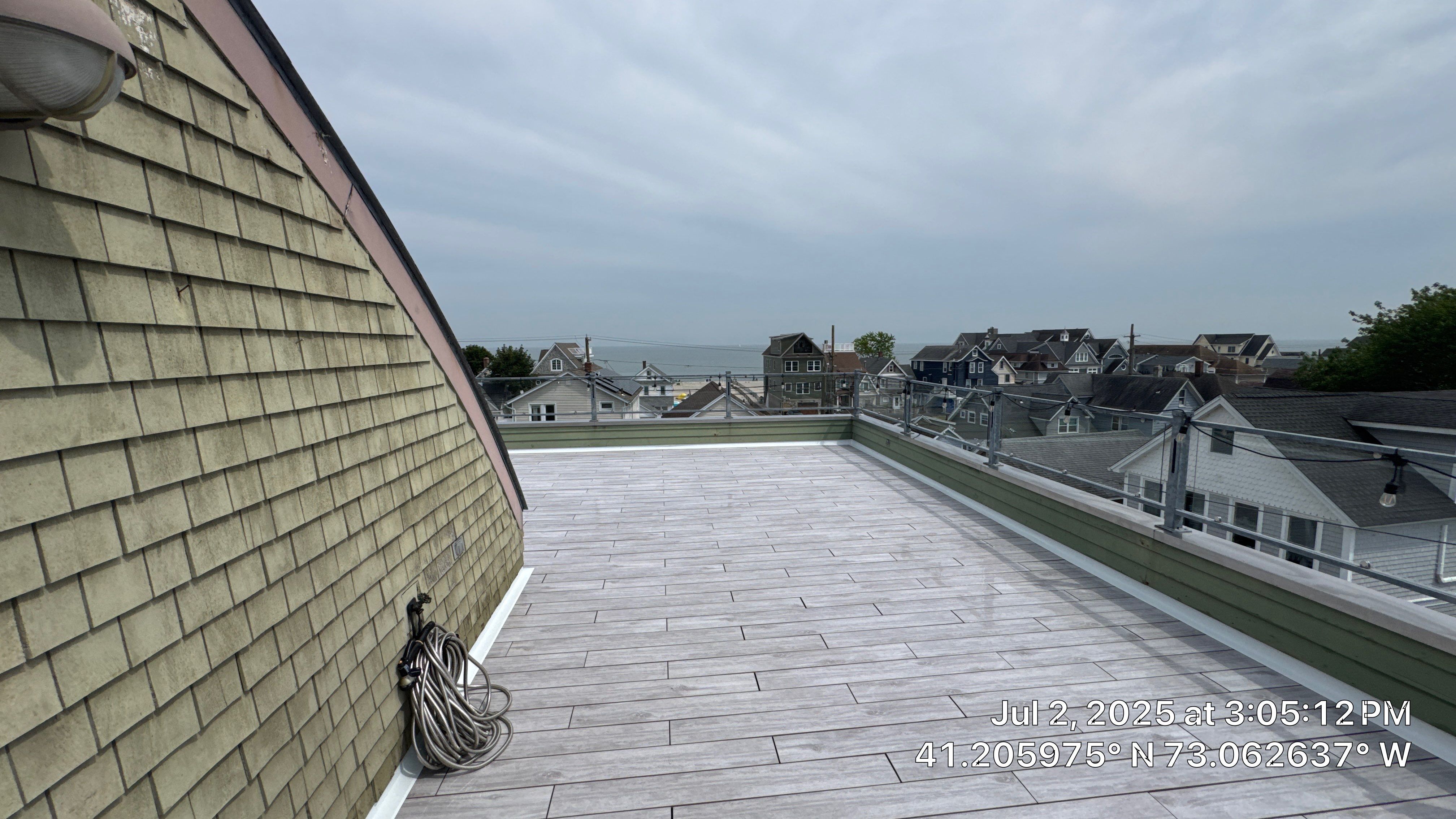 Deck Installation using Tanzite Stone Decking by A Plus Exterior