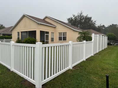 Vinyl Fence Installation using 6Ft White Vinyl Privacy and Picket Fence