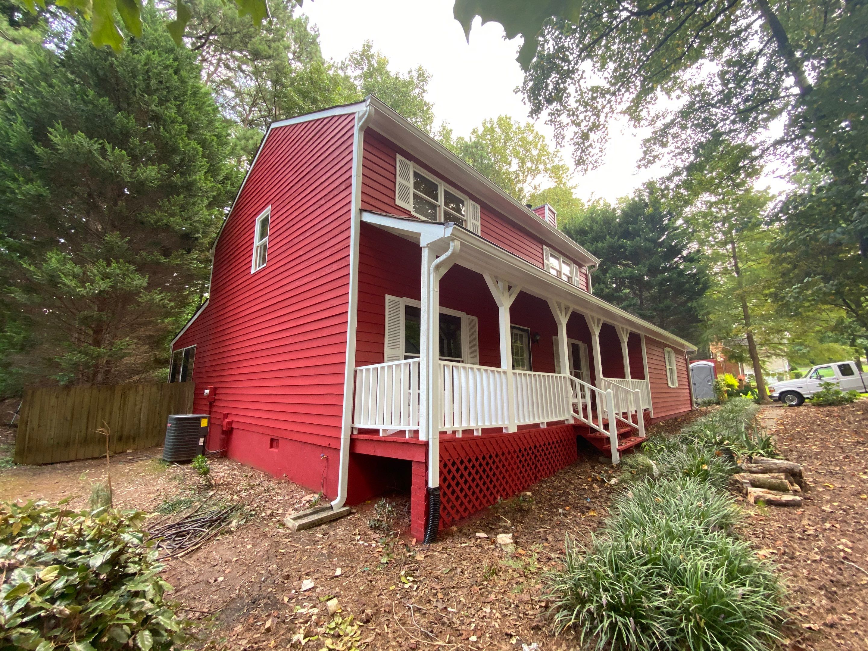Mableton Exterior Painting and Pressure Treated Wood Deck Installation by Swift Home Renovations