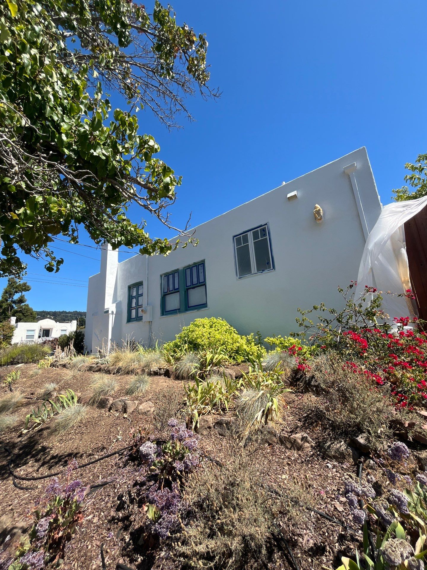 Exterior Transformation with Fresh Stucco and elastomeric system for waterproofing by Herrera’s Bay Area Painting inc.