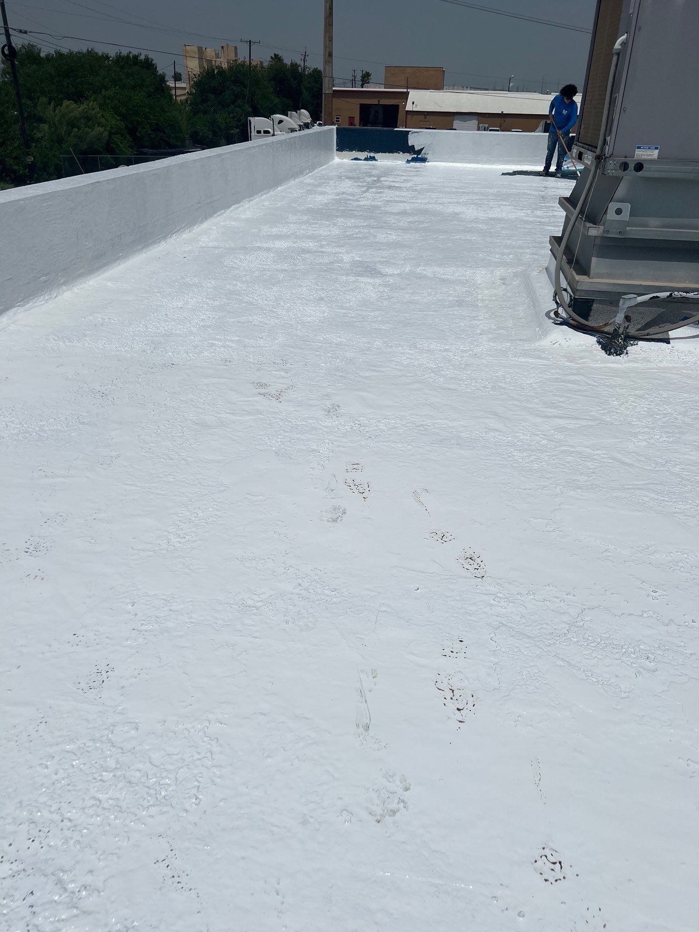 Dirty leaking Gravel Roof by Bayfront Roofing and Construction