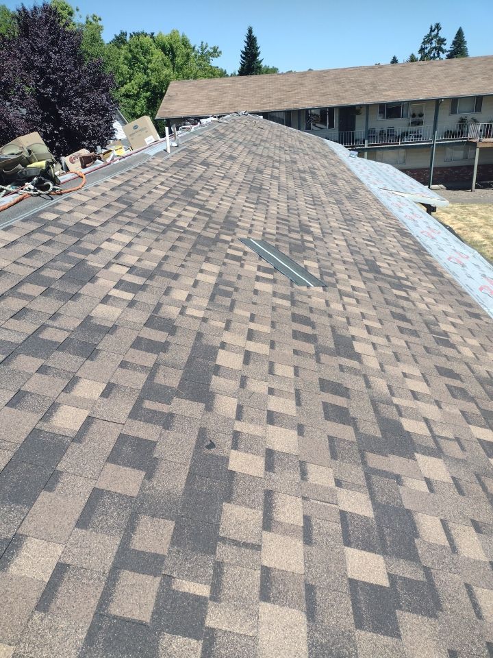 Residential Roofing Installation using IKO Dynasty (Color: Brownstone) by Orezona Building & Roofing Company, Inc.
