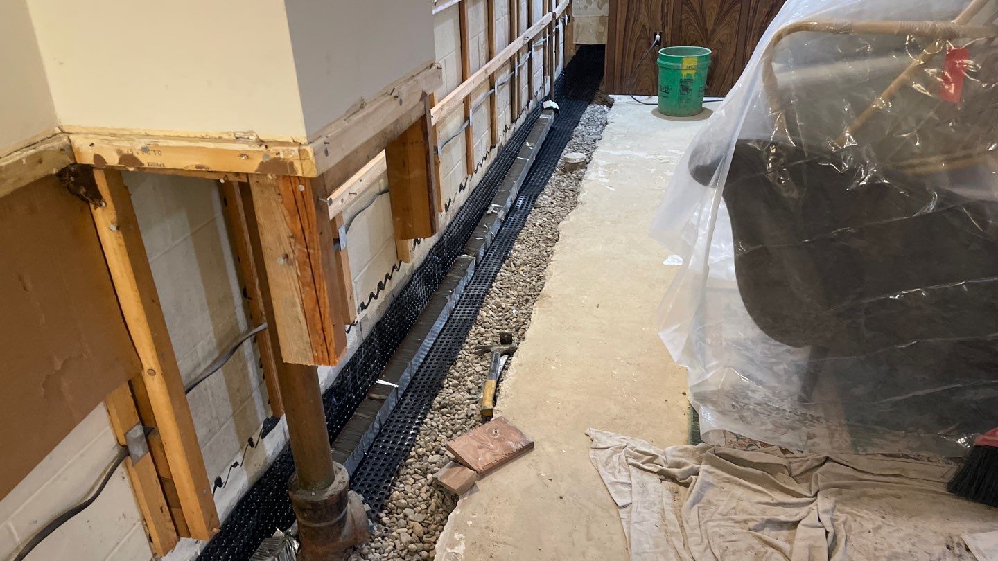 Drain Tile, Sump Pump & Buried Discharge in Columbia Heights by Waterproofing Northeast