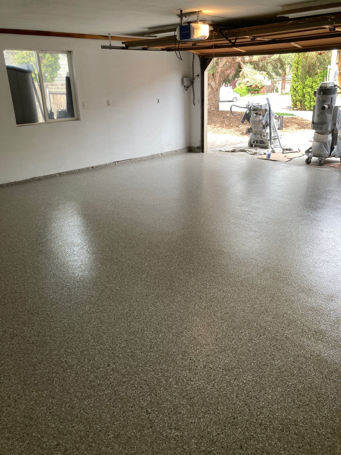 Garage Transformation using Pebble Beach by Croc Coatings, LLC