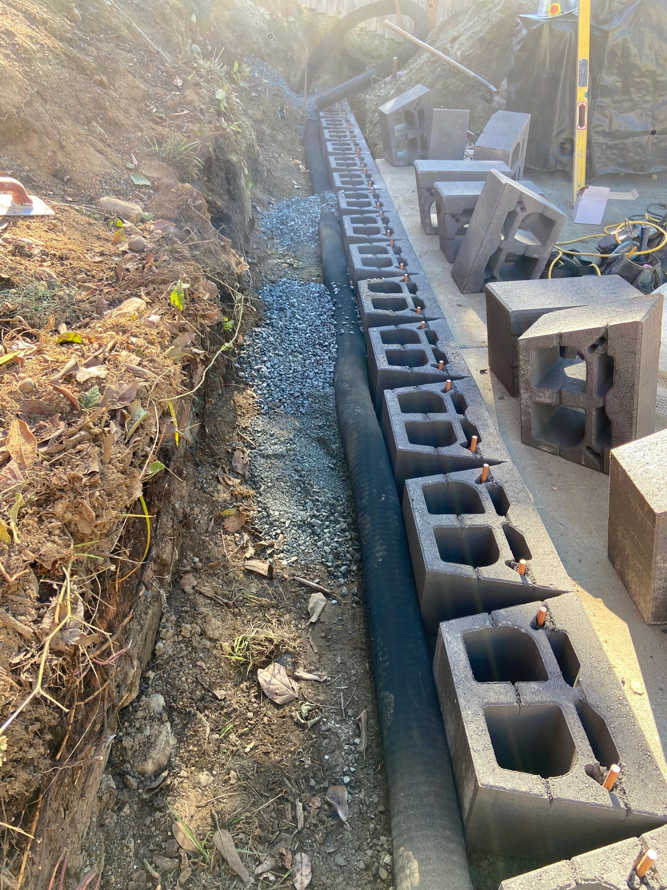 Jireh Outdoor Projects | Retaining Wall & Fence Build by Jireh Asphalt & Concrete Inc 