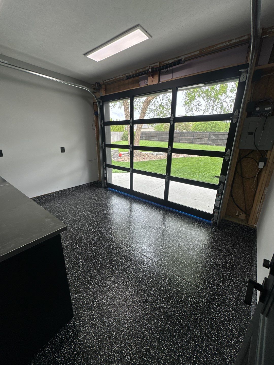 Custom Flake Epoxy Garage Floor in Lincoln by Goat Coatings