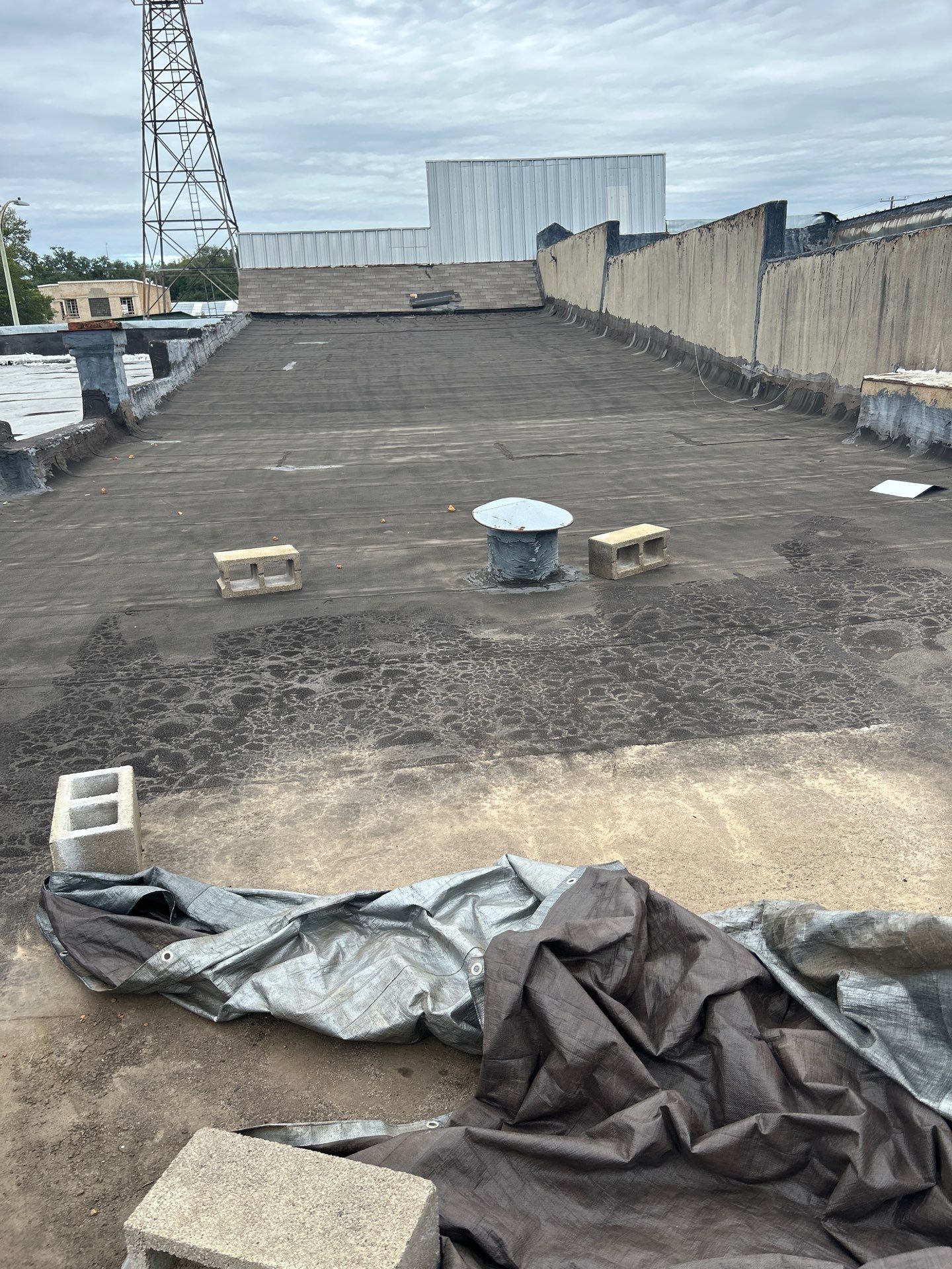 Downtown Gladewater Commercial Foam Roof Restoration – SPF + High-Tensile Acrylic by All Star Roofing LLC