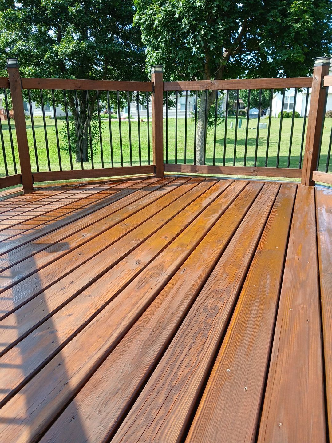 Tucker Deck Staining  by Two Brothers Residential Maintenance