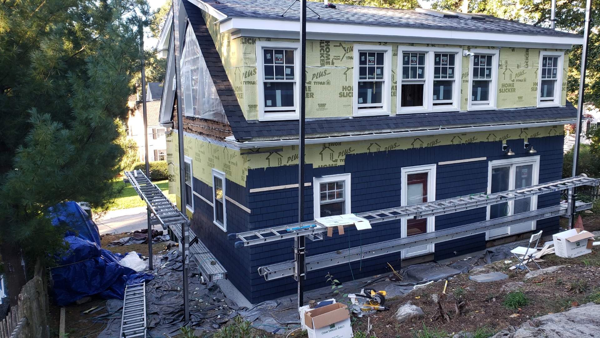 Siding Installation using Red Cedar by UBrothers Construction