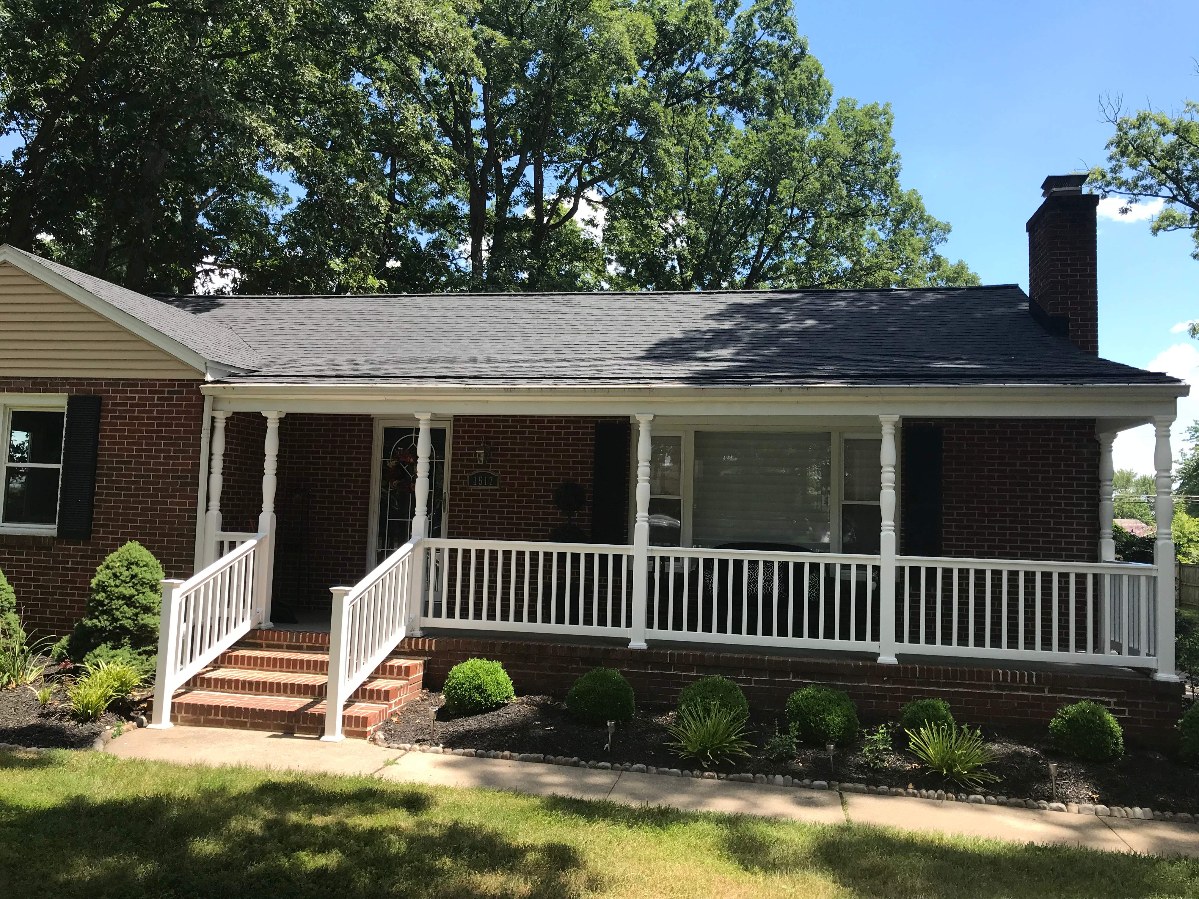 Residential Roofing Installation using Charcoal Black by Alpha Design Services