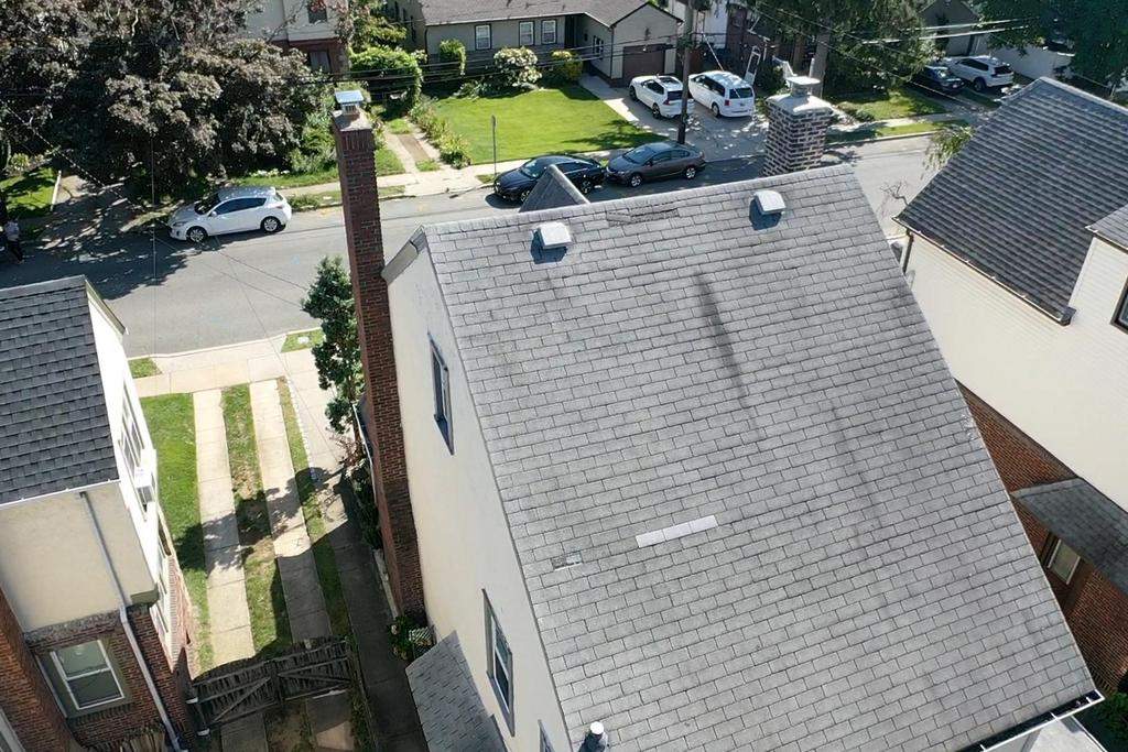 New Roof & Gutters by Island Roofing Inc.