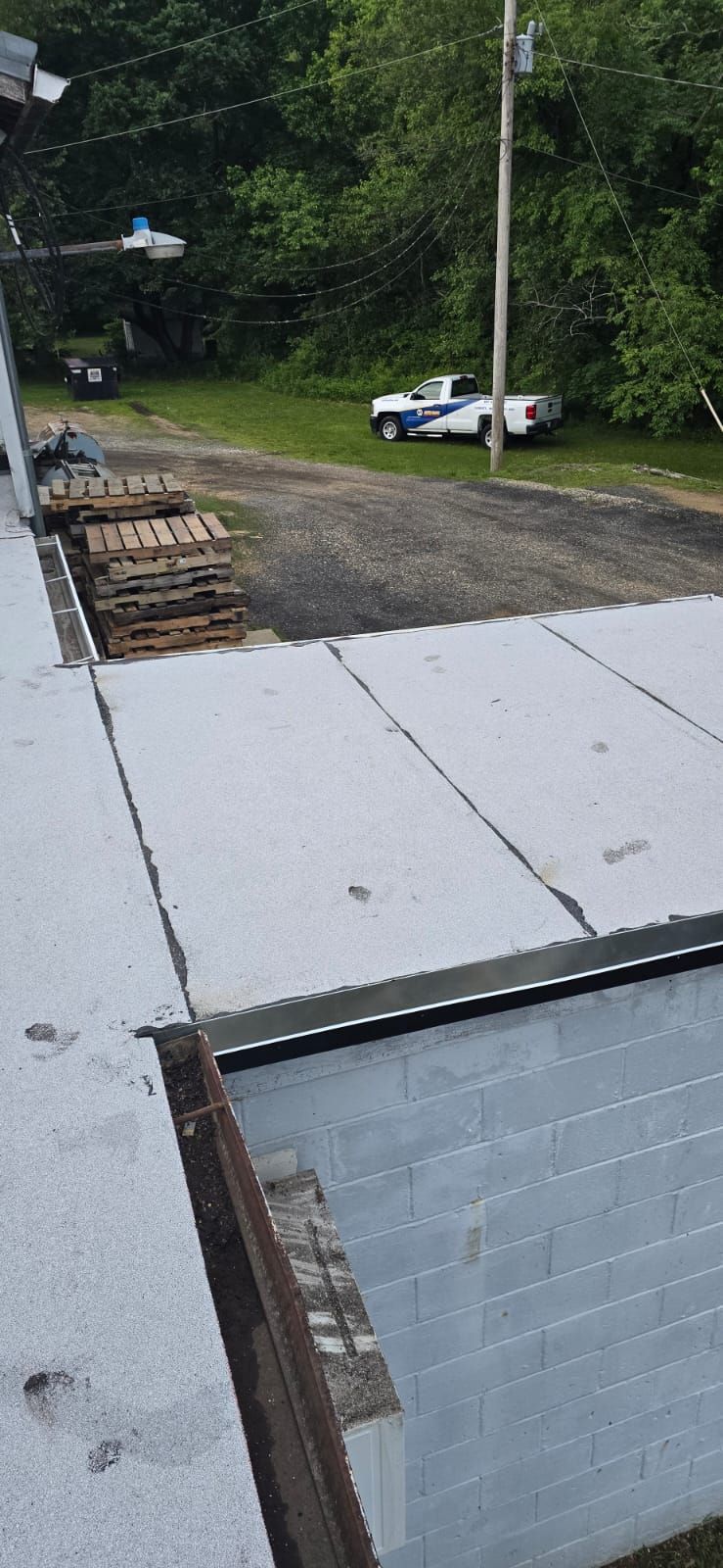 Roof Installation using Silicone APP Elevate Coating by ExteriorPros