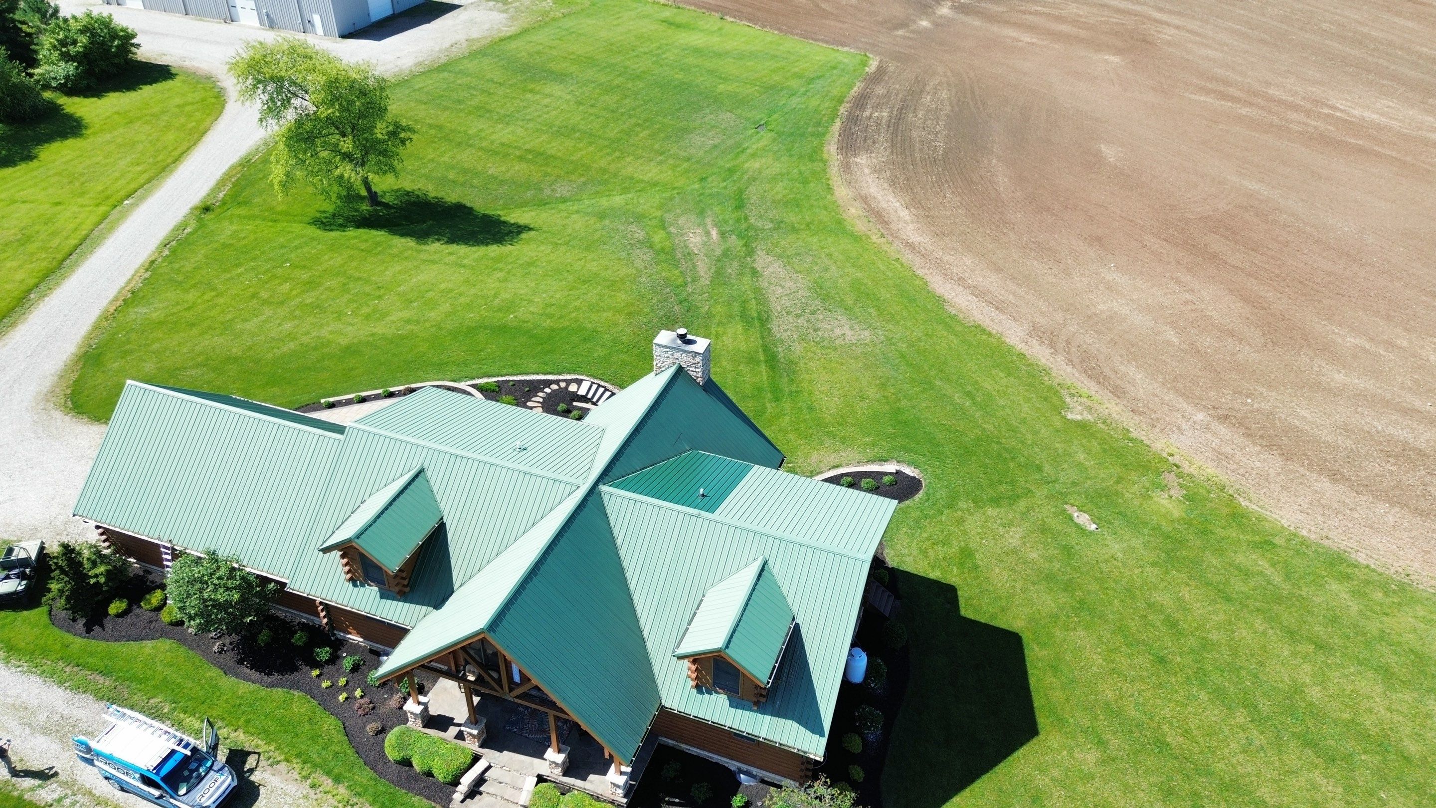 Residential Roofing Installation using Performance Panel Metal - Frost Black by RoofX 