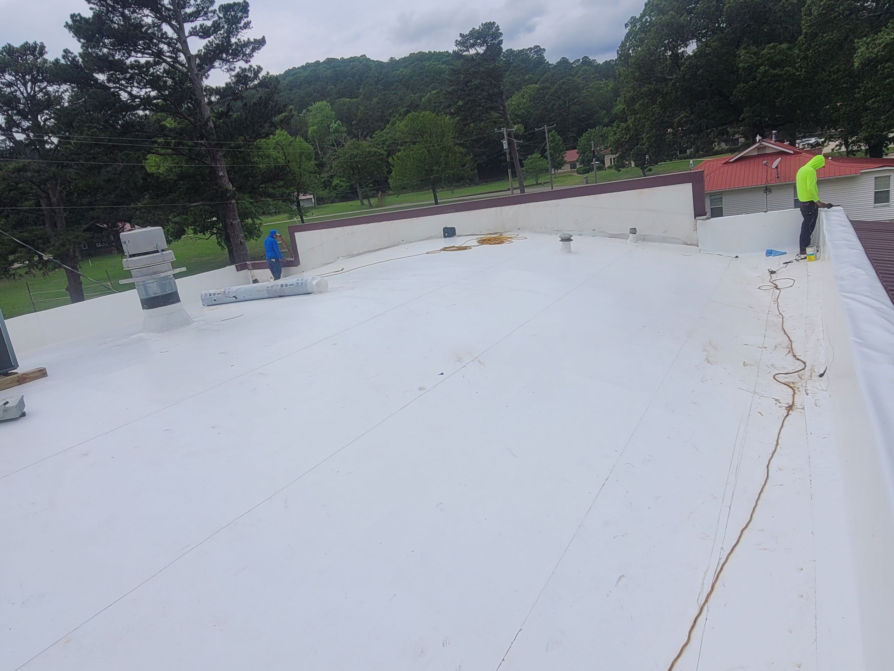Choctaw Nation Healthcare Center - White Building by Hostetler Roofing
