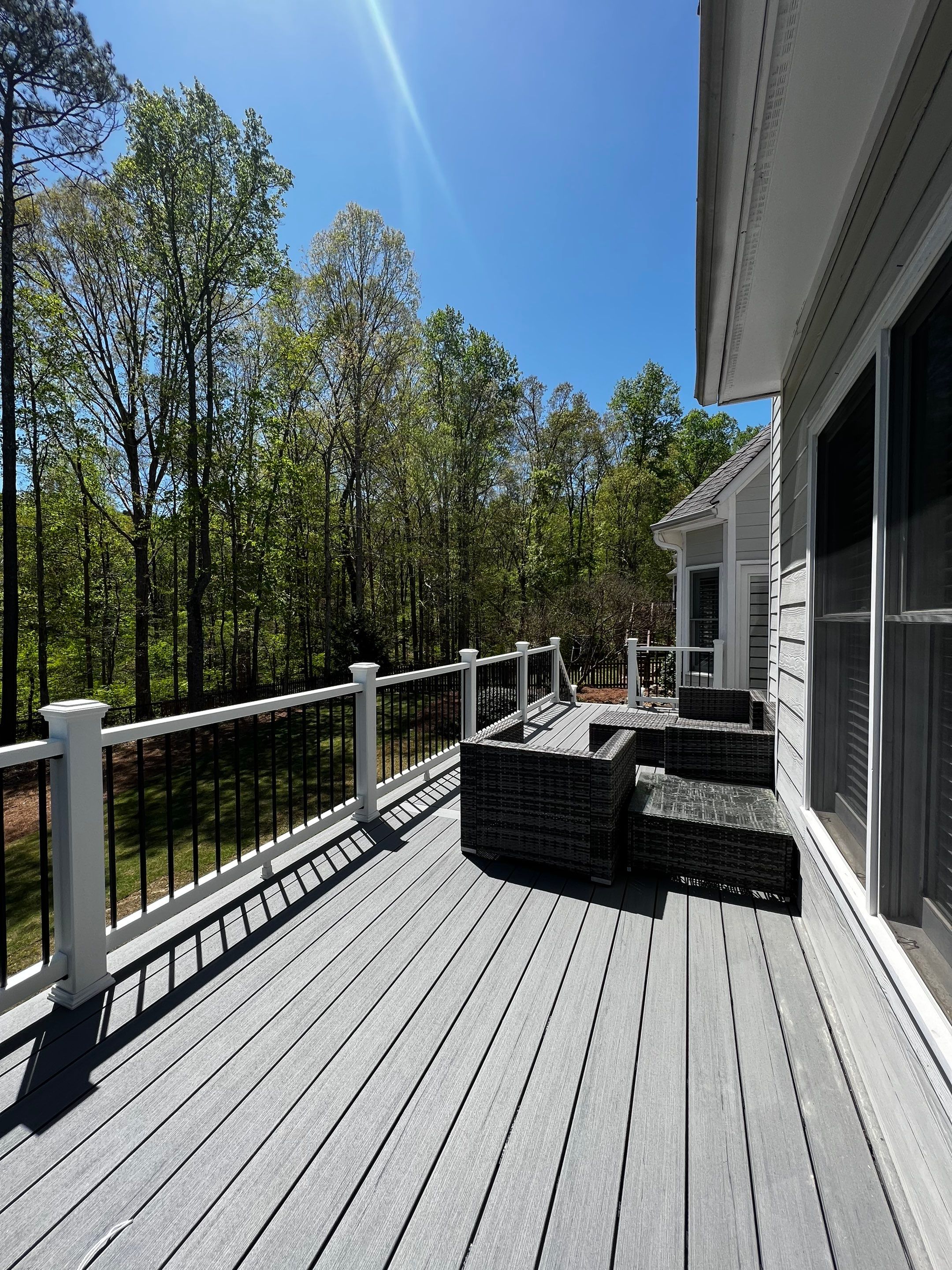 Elevated Grey Composite Deck Installation in Woodstock by Swift Home Renovations 