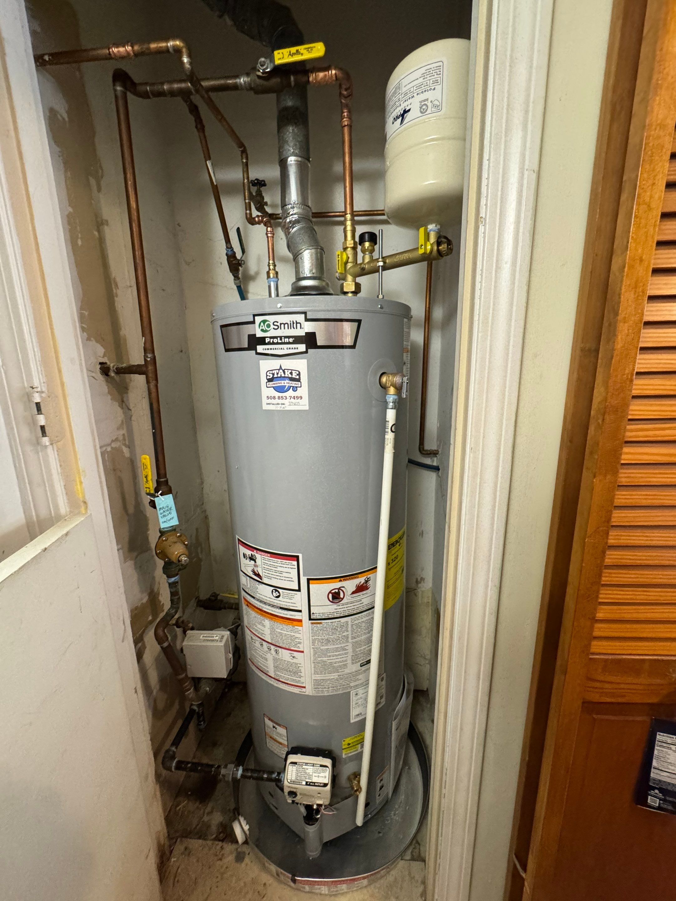 Closet Water Heater Replacement by Stake Plumbing and Heating