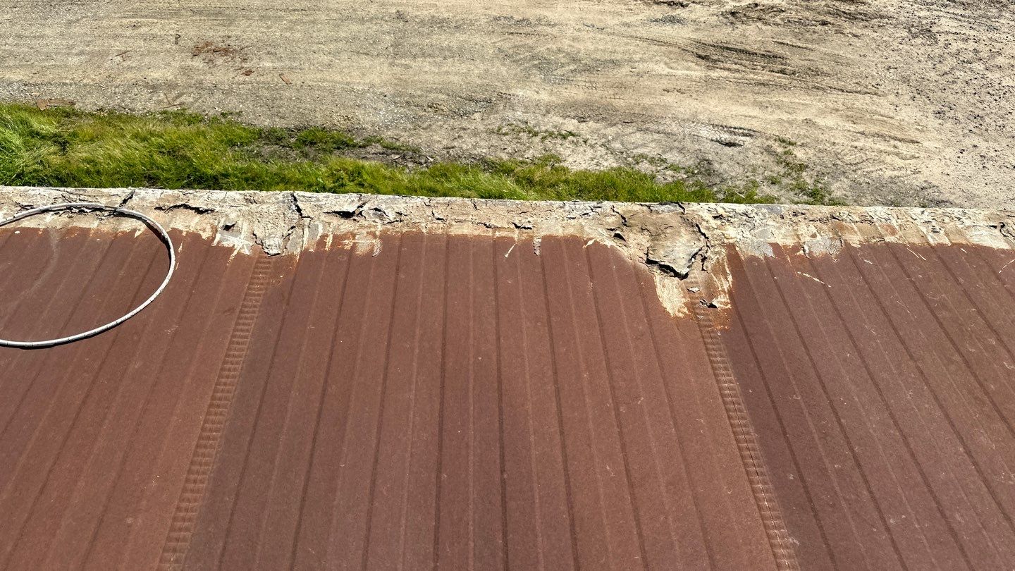 Foam and coatings on mobile home by Straight Edge Roofing Inc