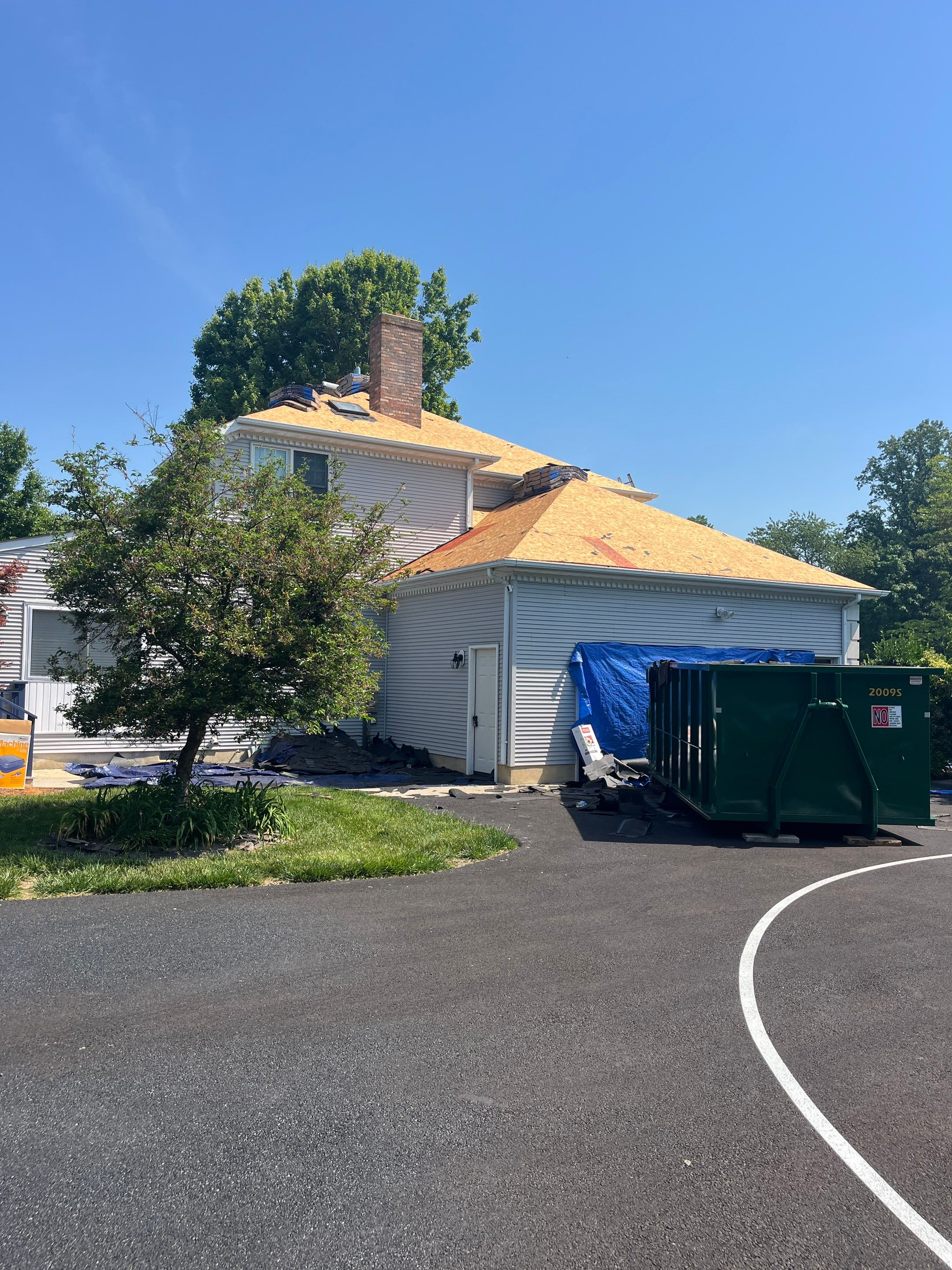 Full Roof Replacement and Skylight Installation in Camden Wyoming by First Chesapeake Roofing