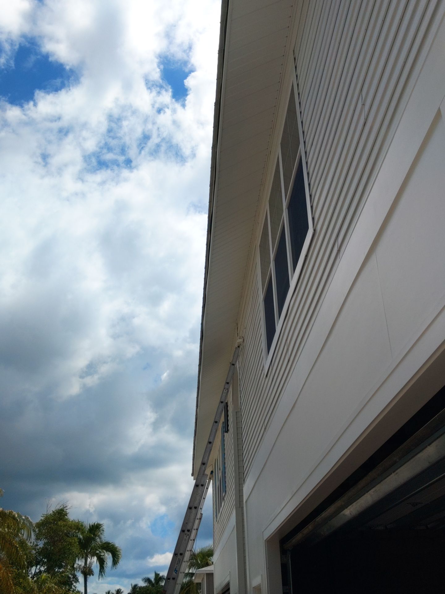 Complete Gutter System with Downspouts & Guards in Fort Myers Beach FL by Gutter Professors