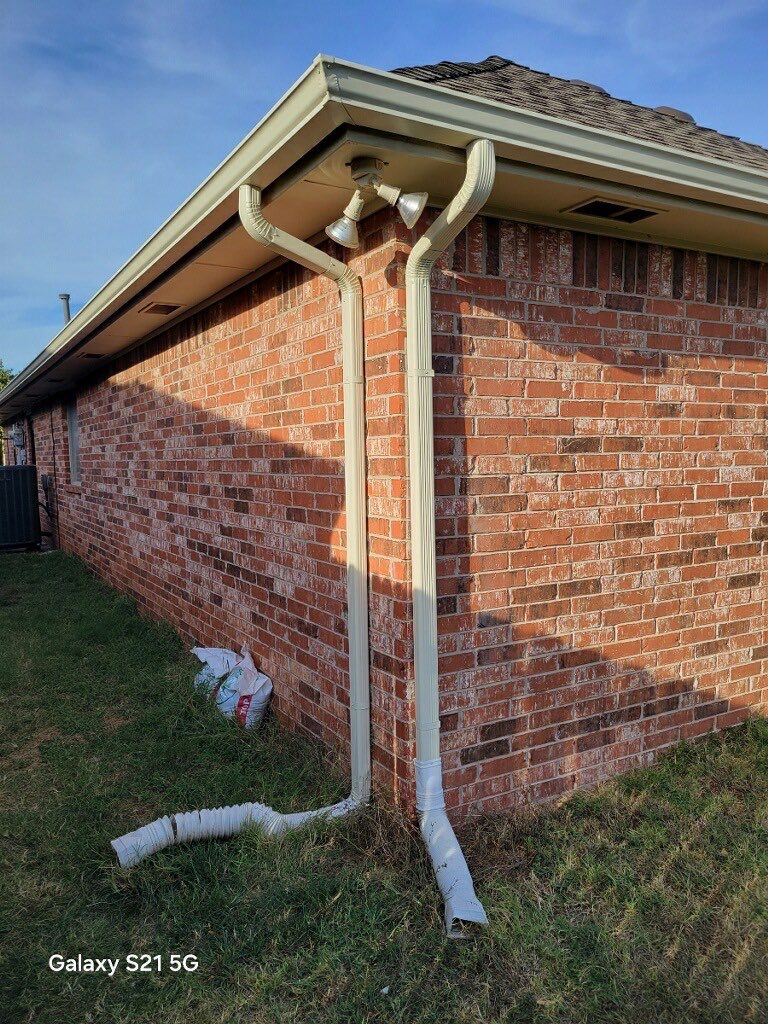 Roof Replacement and Gutter Installment in Edmond, OK by McCann's Roofing and Construction