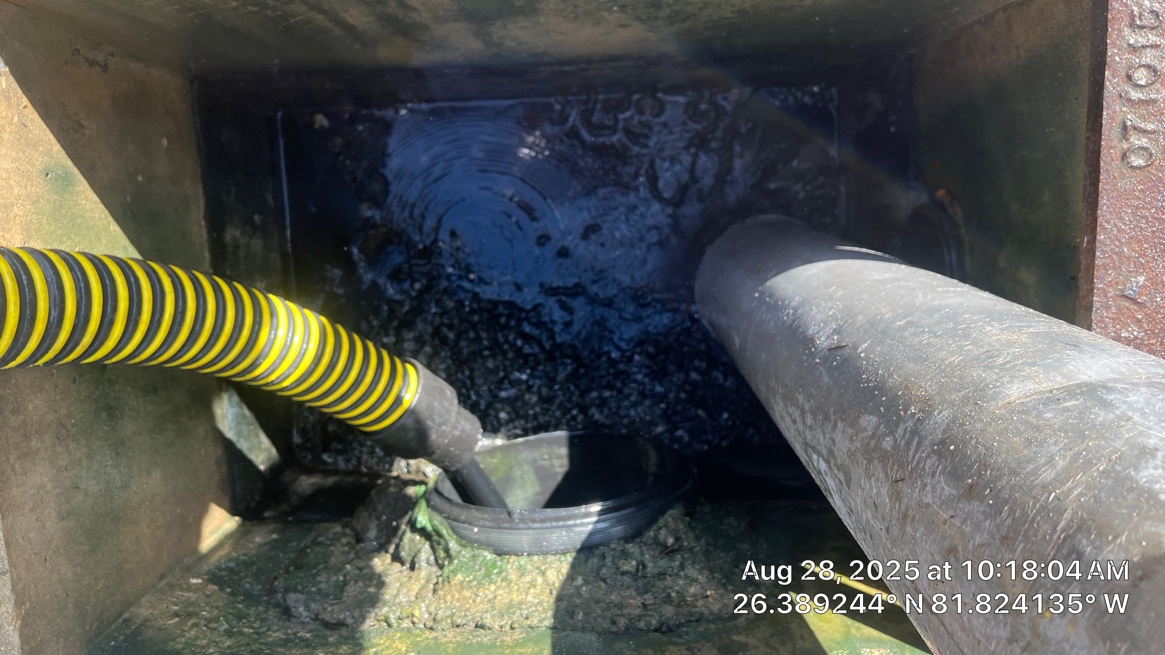 Pelican Landing Tennis Court Catch Basin Cleaning by APS Power & Water