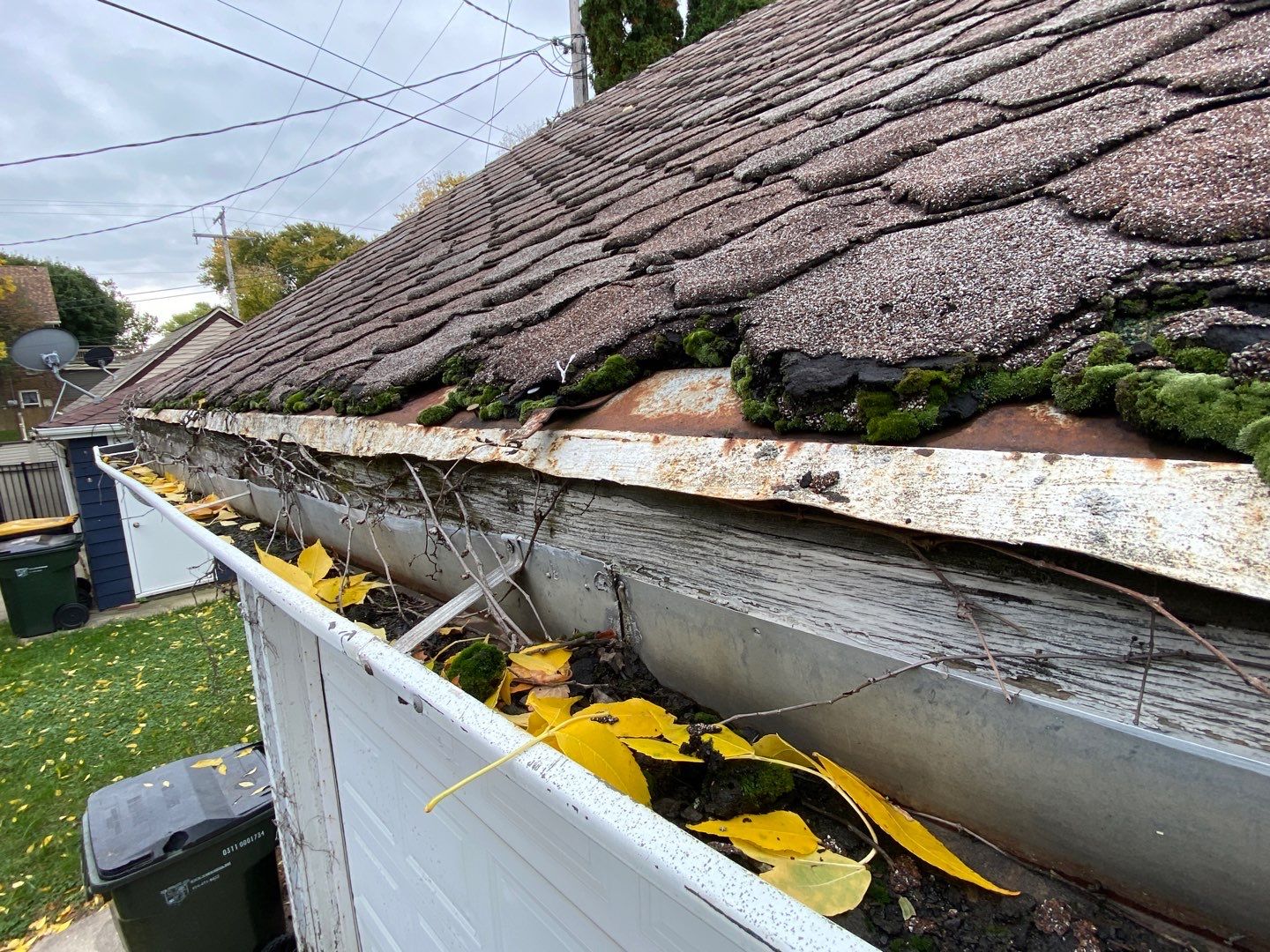 Asphalt Roof, Vinyl Siding, and Aluminum Gutter Replacement by Custom Installations